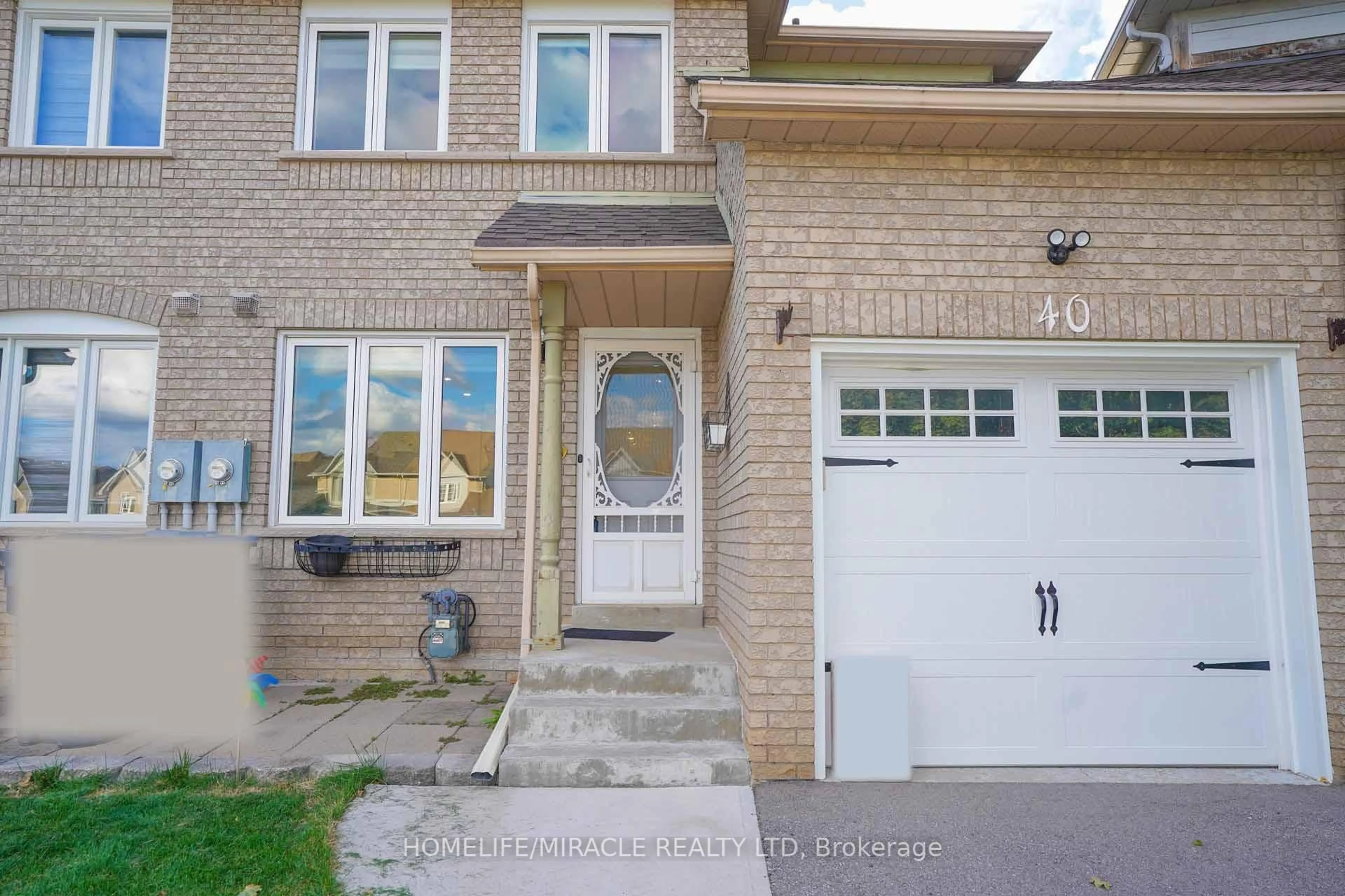 Home with brick exterior material, street for 40 Gardenia Way, Caledon Ontario L7C 1B2
