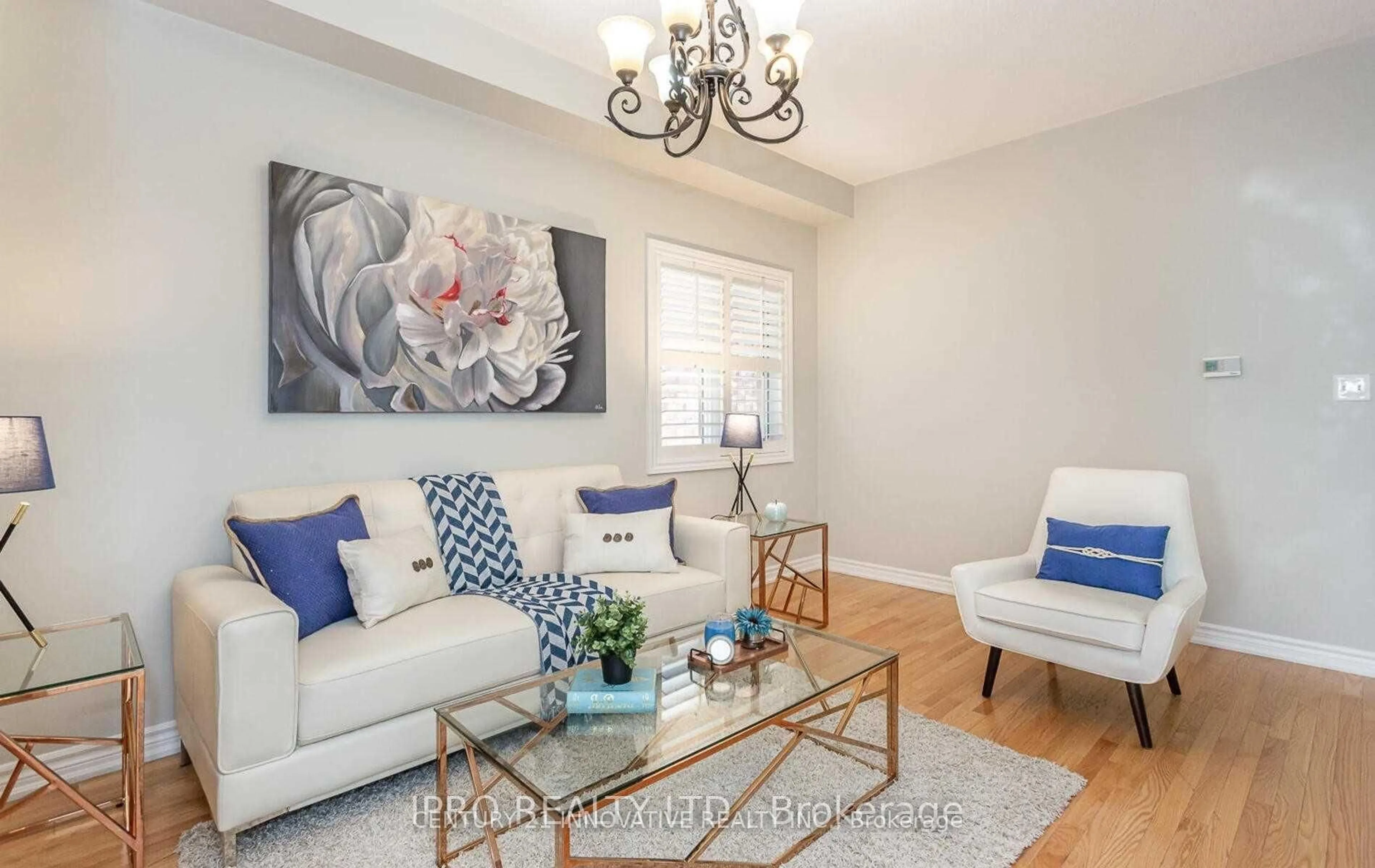 Living room with furniture, wood/laminate floor for 126 Footbridge Cres, Brampton Ontario L6R 0T9