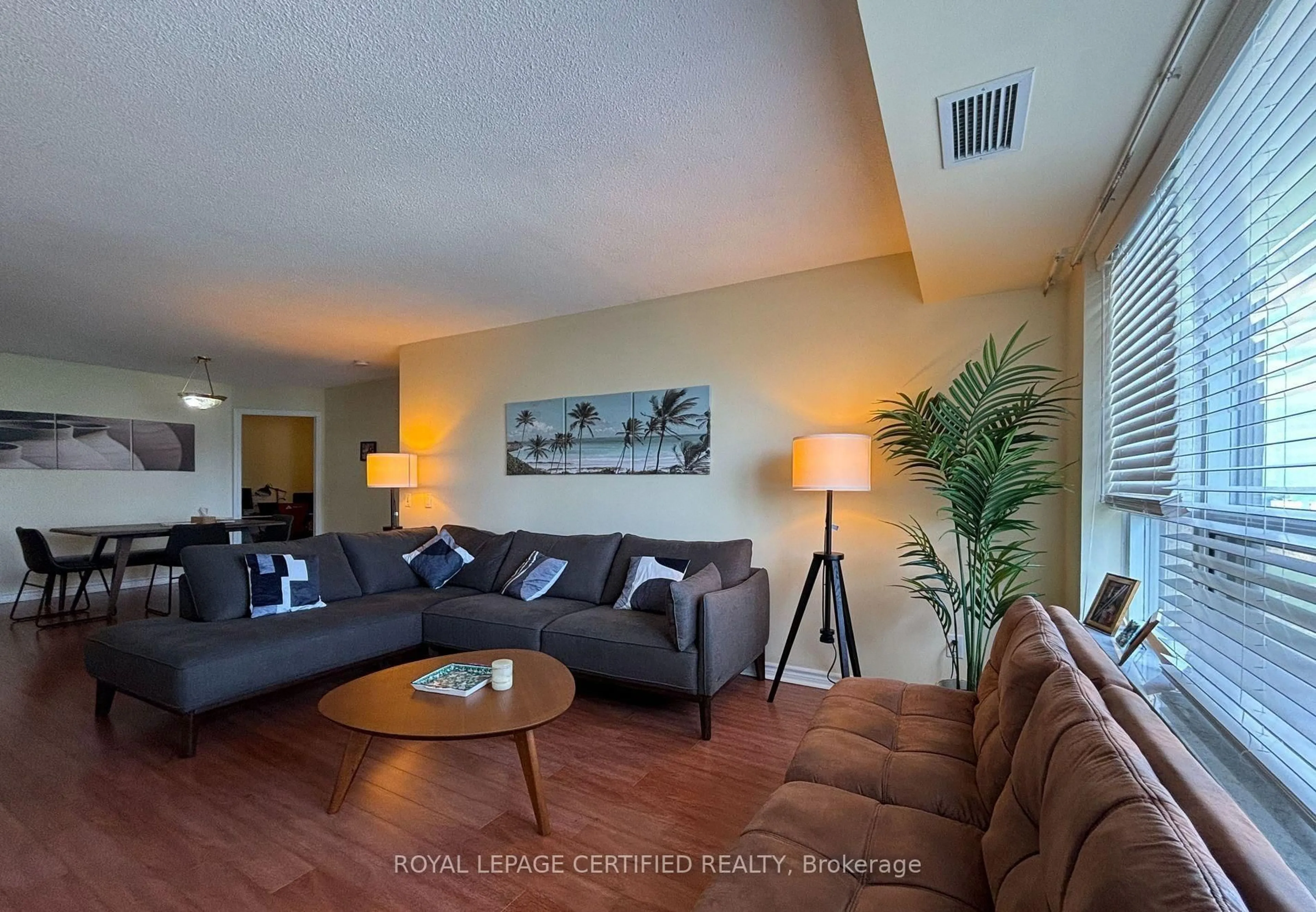 Living room with furniture, unknown for 25 Kingsbridge Garden Circ #1526, Mississauga Ontario L5R 3Z5