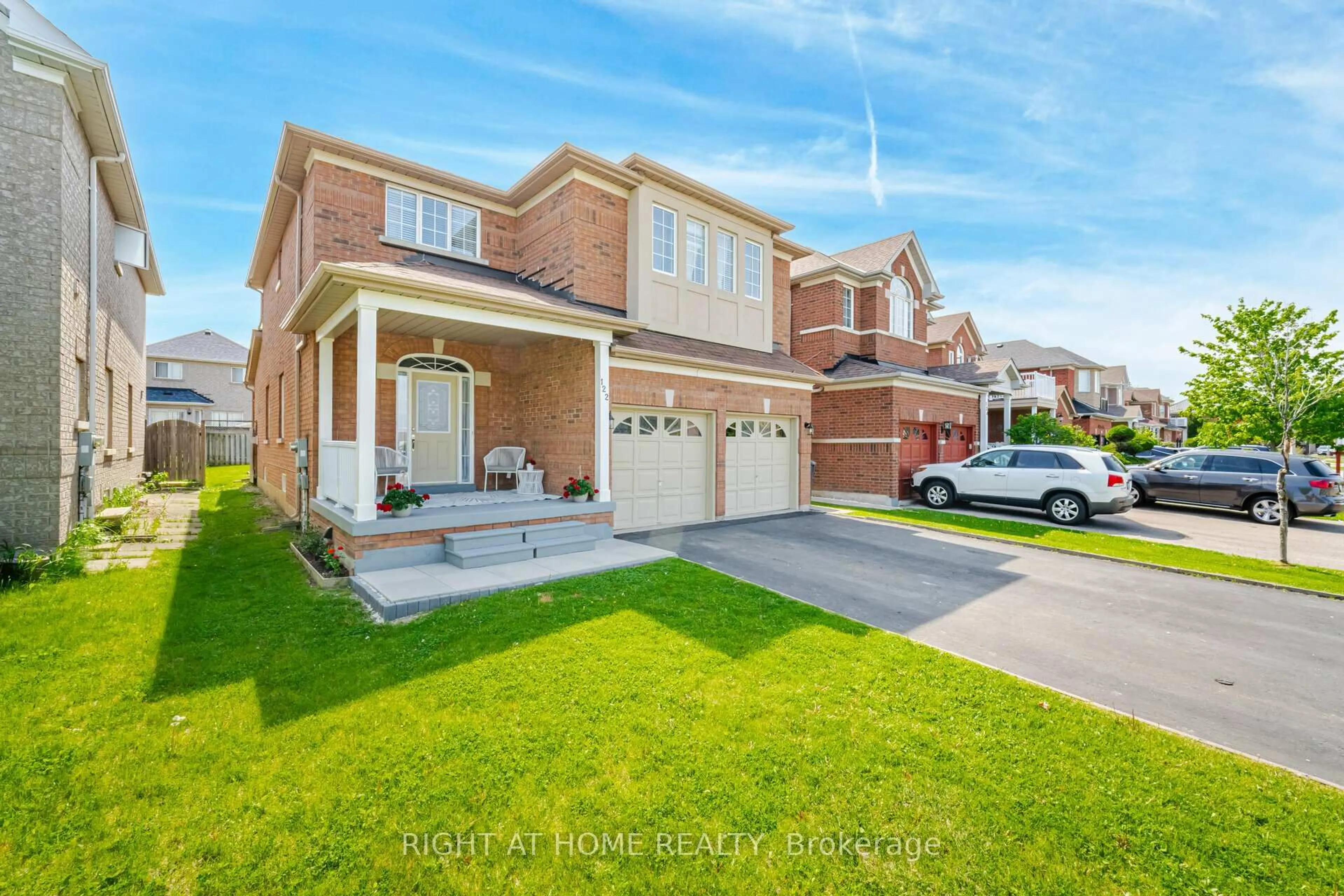 Home with brick exterior material, street for 122 Fletchers Creek Blvd, Brampton Ontario L6X 4V3