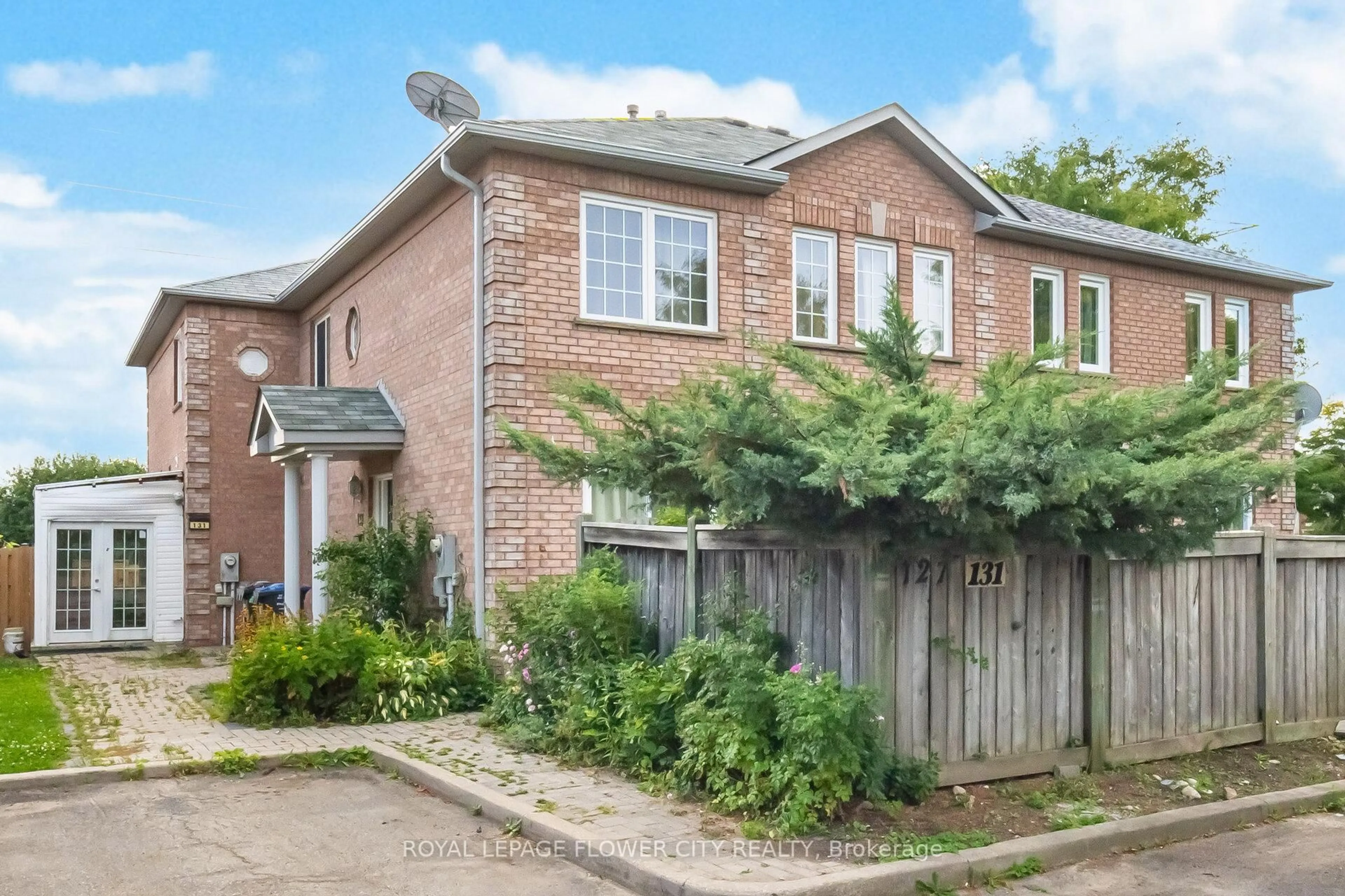 Home with brick exterior material, street for 131 Millstone Dr, Brampton Ontario L6Y 4P4