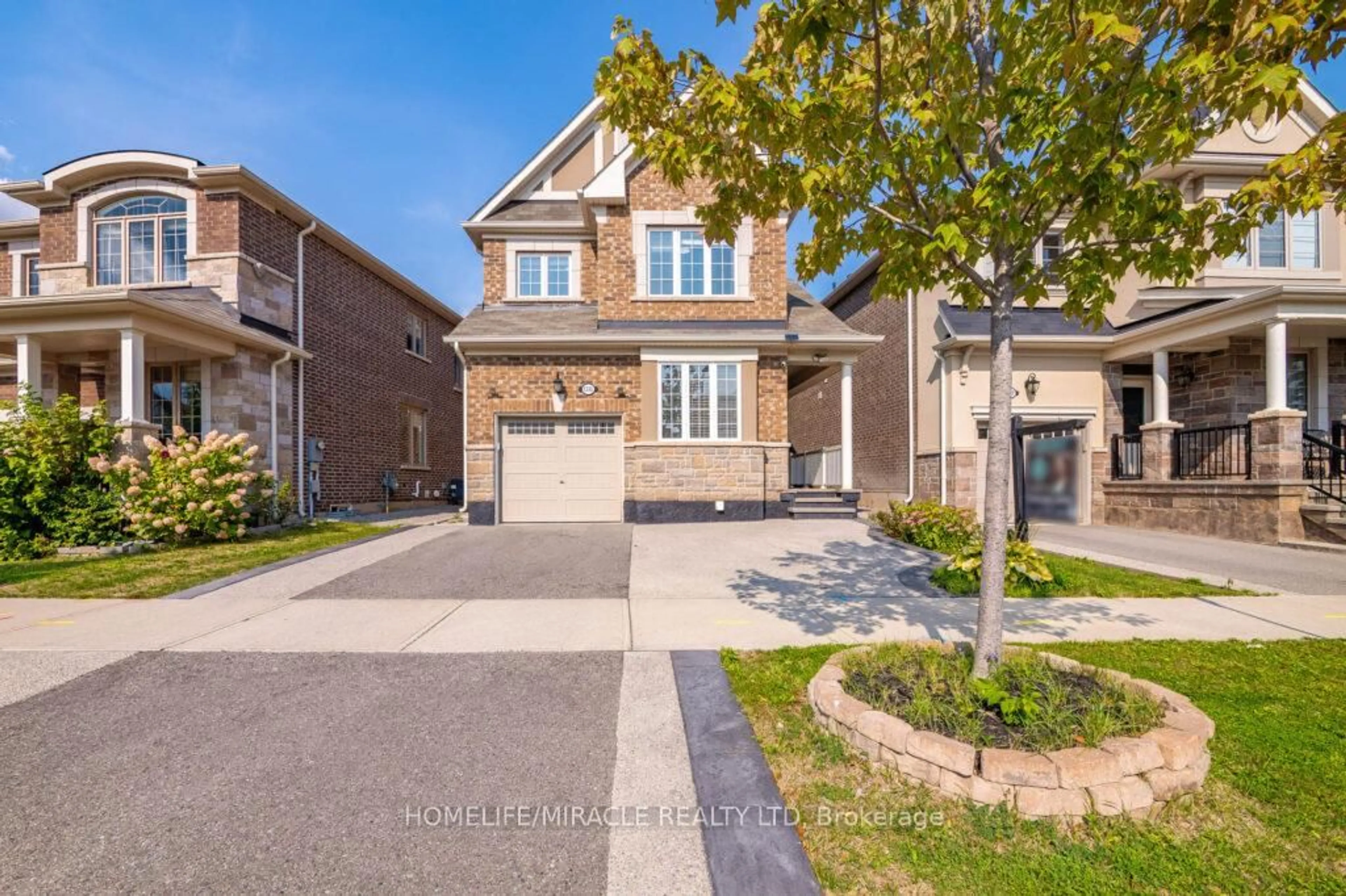 Home with brick exterior material, street for 1335 Rose Way, Milton Ontario L9E 1M5