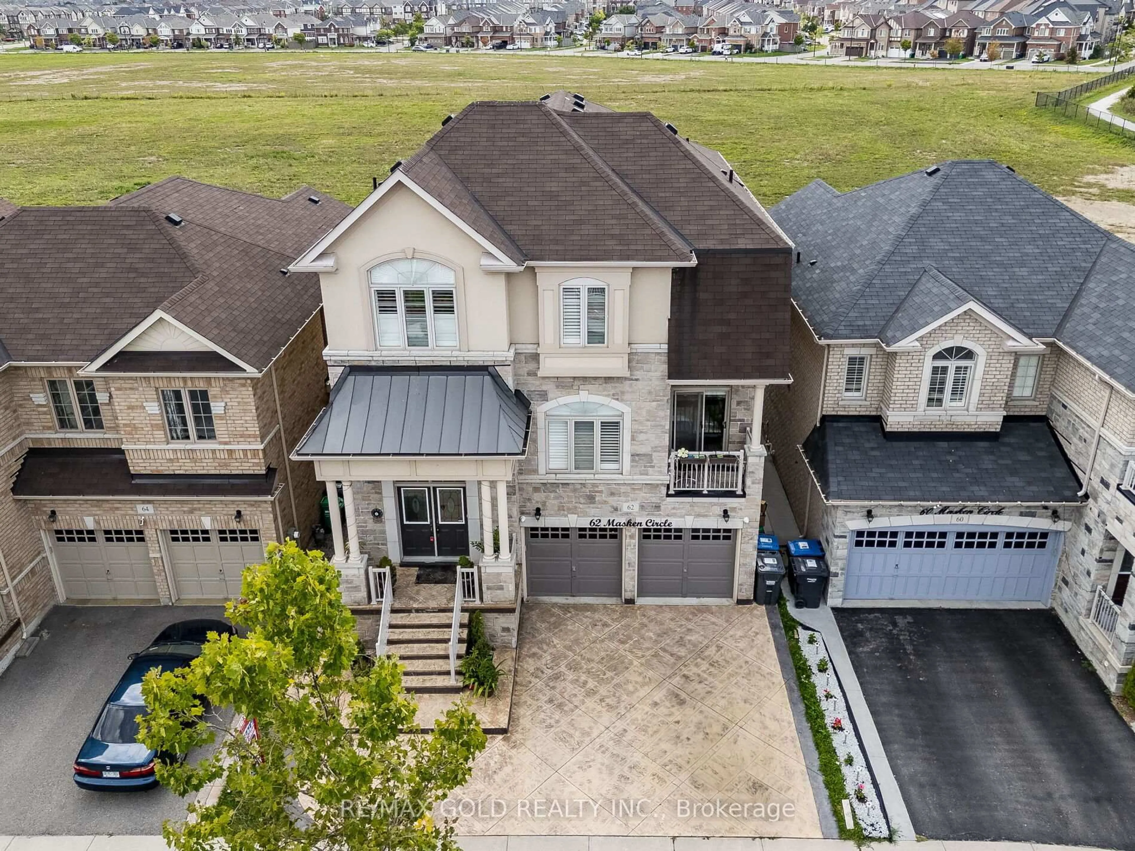 A pic from outside/outdoor area/front of a property/back of a property/a pic from drone, street for 62 Masken Circ, Brampton Ontario L7A 4K3