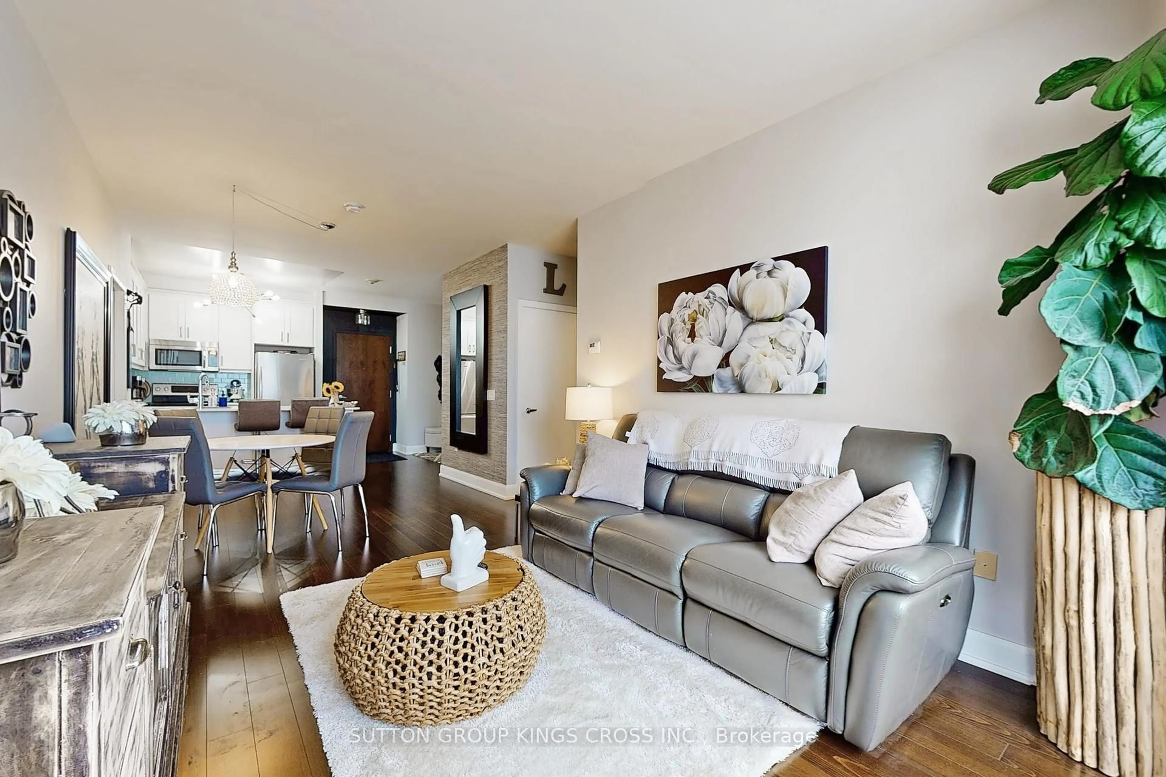 Living room with furniture, wood/laminate floor for 2470 Prince Michael Dr #201, Oakville Ontario L6H 0G9