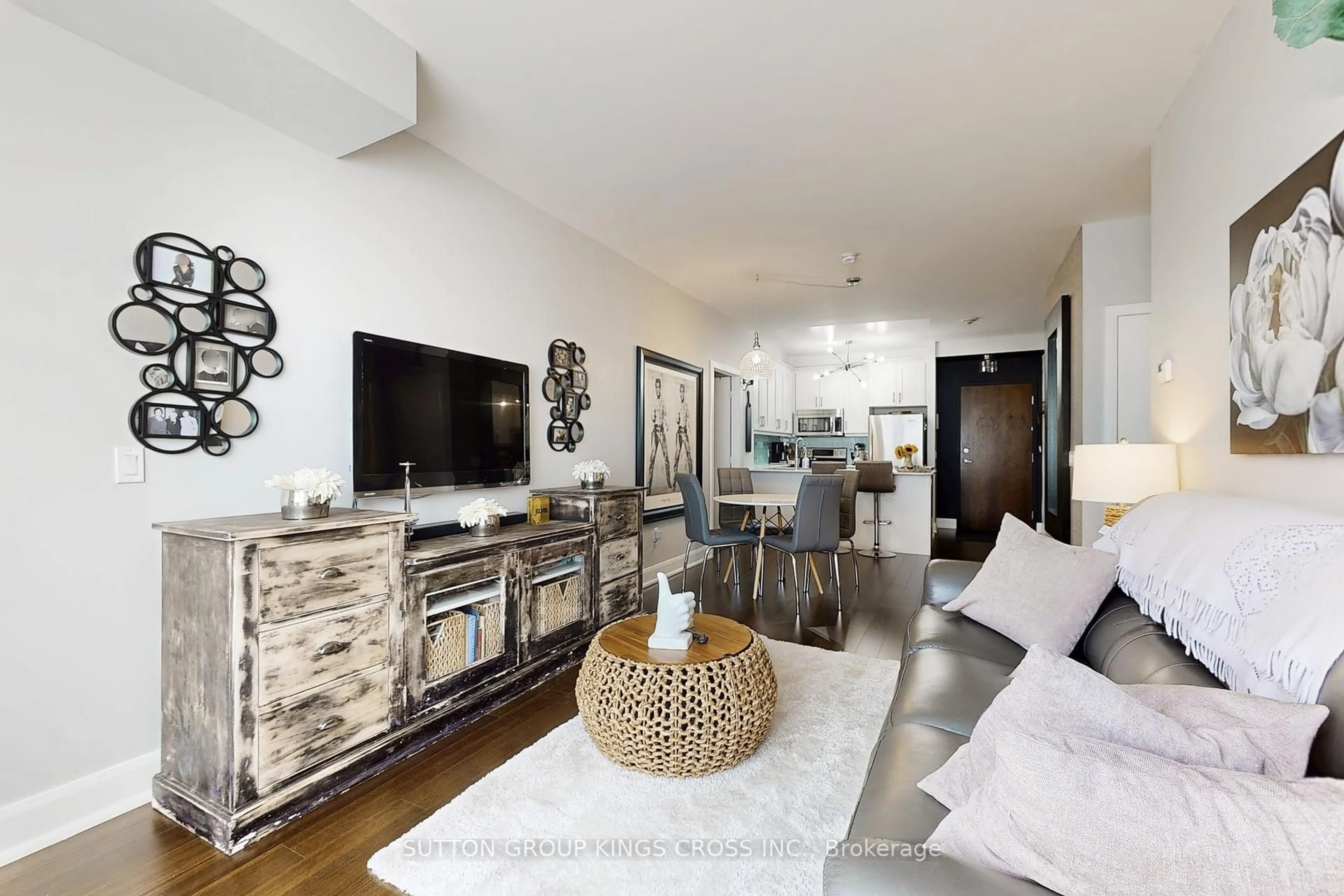 Living room with furniture, wood/laminate floor for 2470 Prince Michael Dr #201, Oakville Ontario L6H 0G9