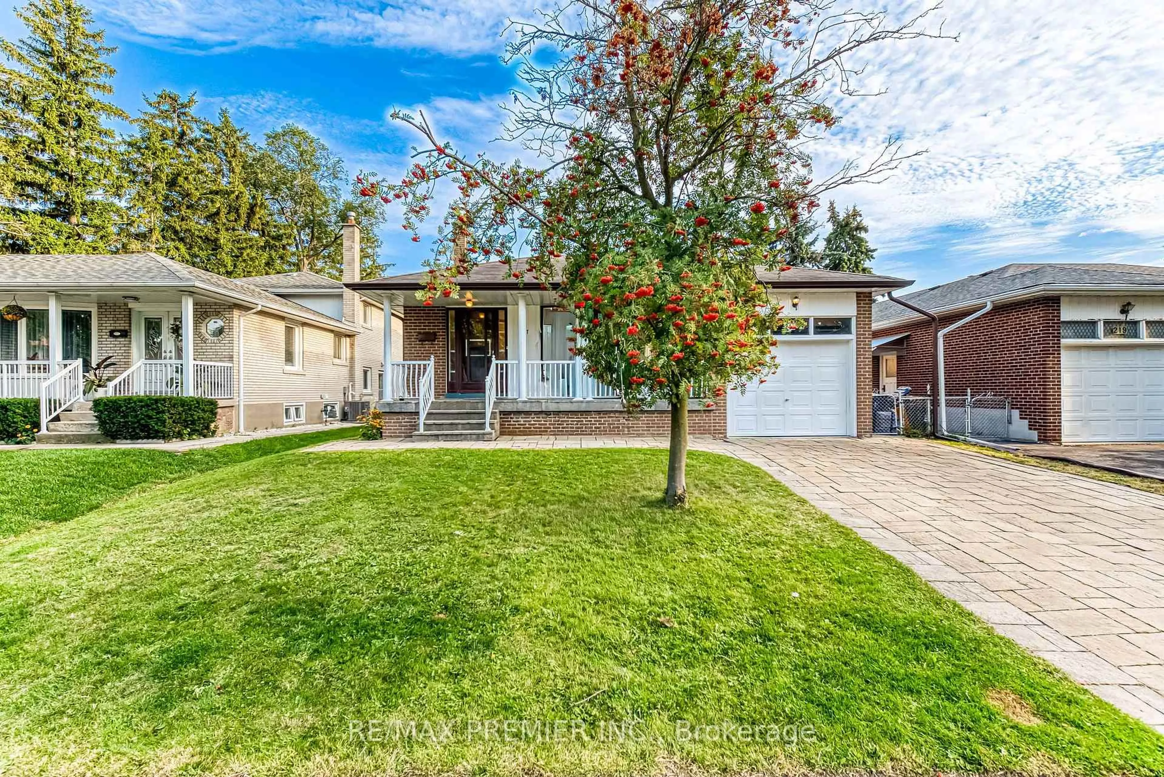 Home with vinyl exterior material, street for 217 La Rose Ave, Toronto Ontario M9P 1B6