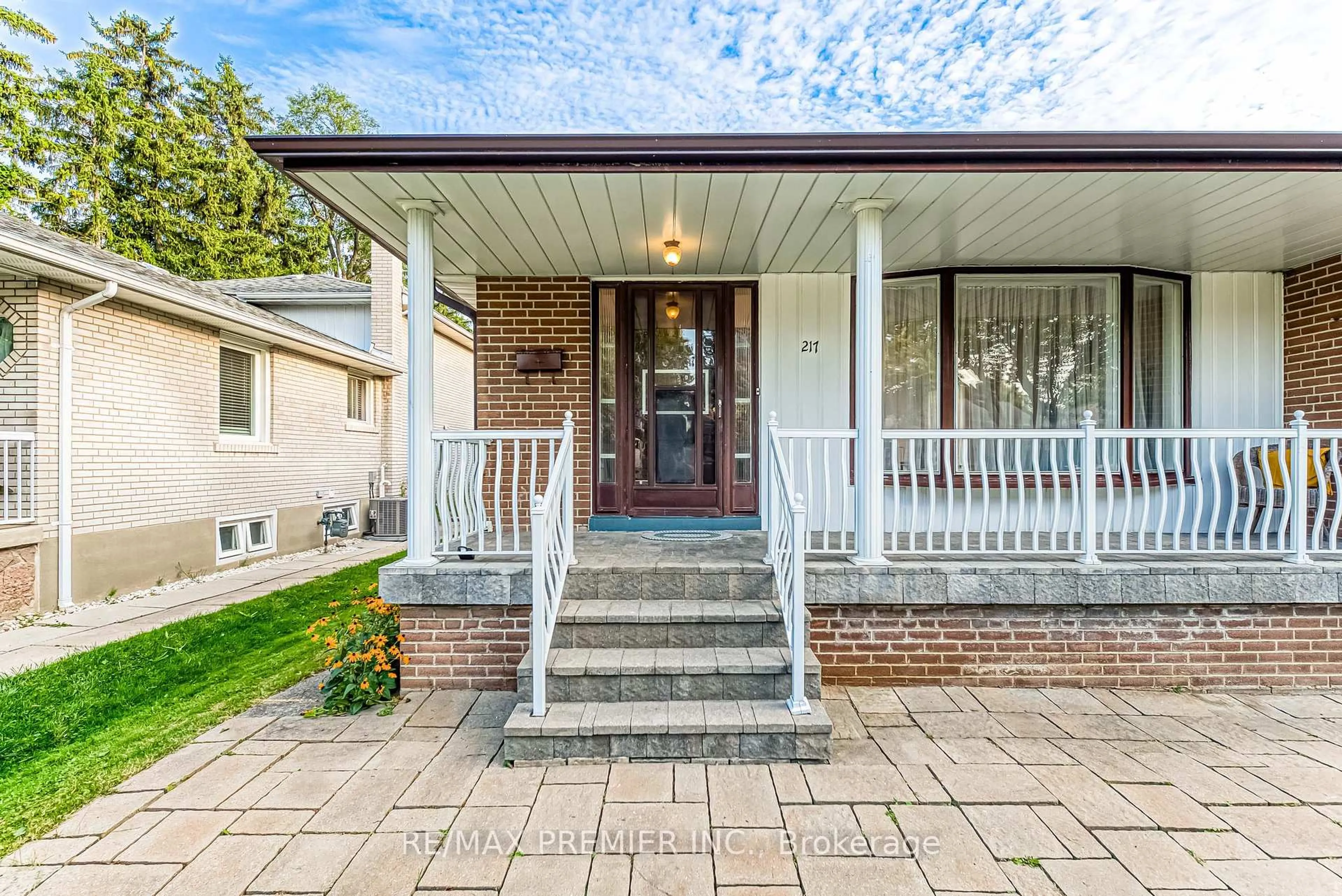 Home with brick exterior material, street for 217 La Rose Ave, Toronto Ontario M9P 1B6