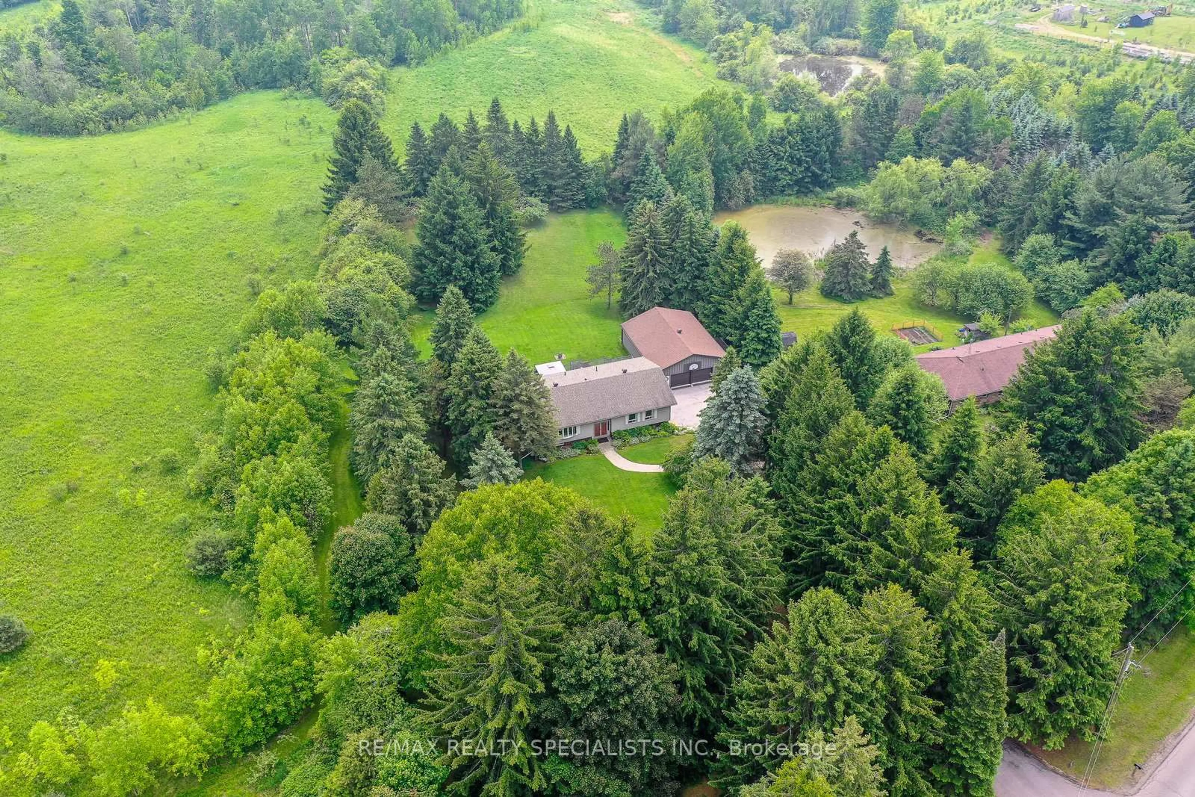 A pic from outside/outdoor area/front of a property/back of a property/a pic from drone, forest/trees view for 6739 Castlederg Sdrd, Caledon Ontario L7C 0P6