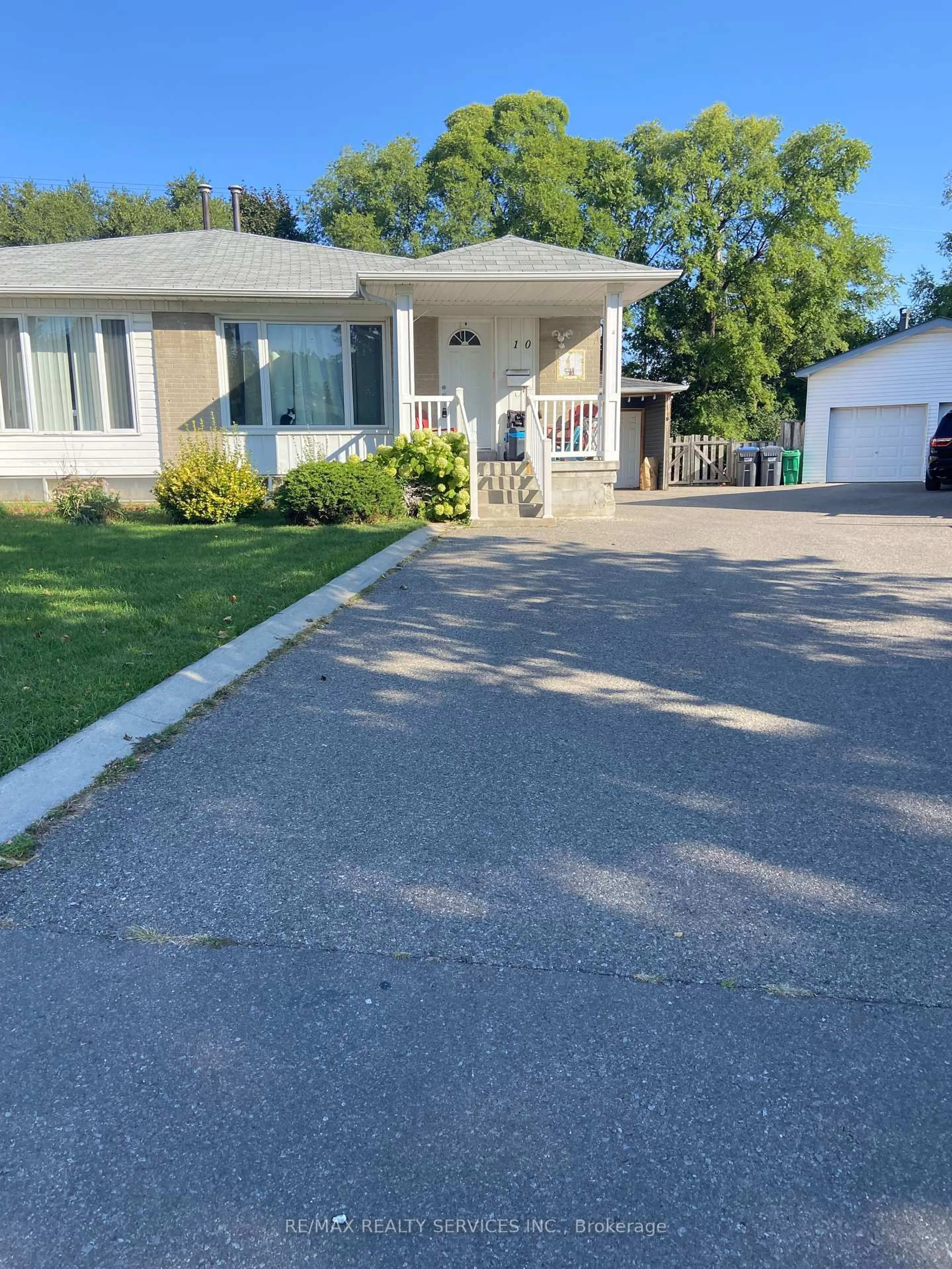 Home with vinyl exterior material, street for 10 Chatsworth Dr, Brampton Ontario L6X 2L9