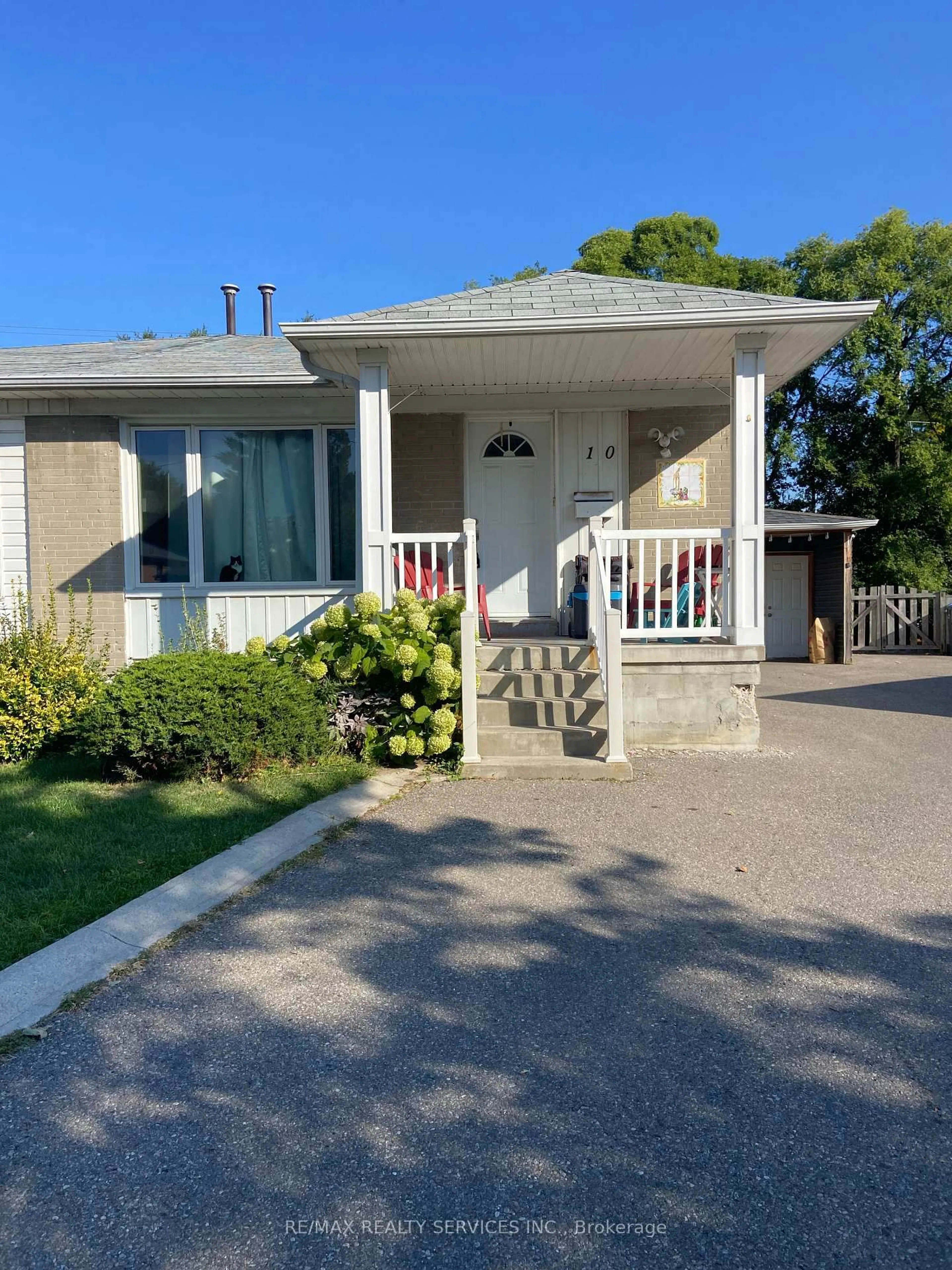 Home with vinyl exterior material, street for 10 Chatsworth Dr, Brampton Ontario L6X 2L9