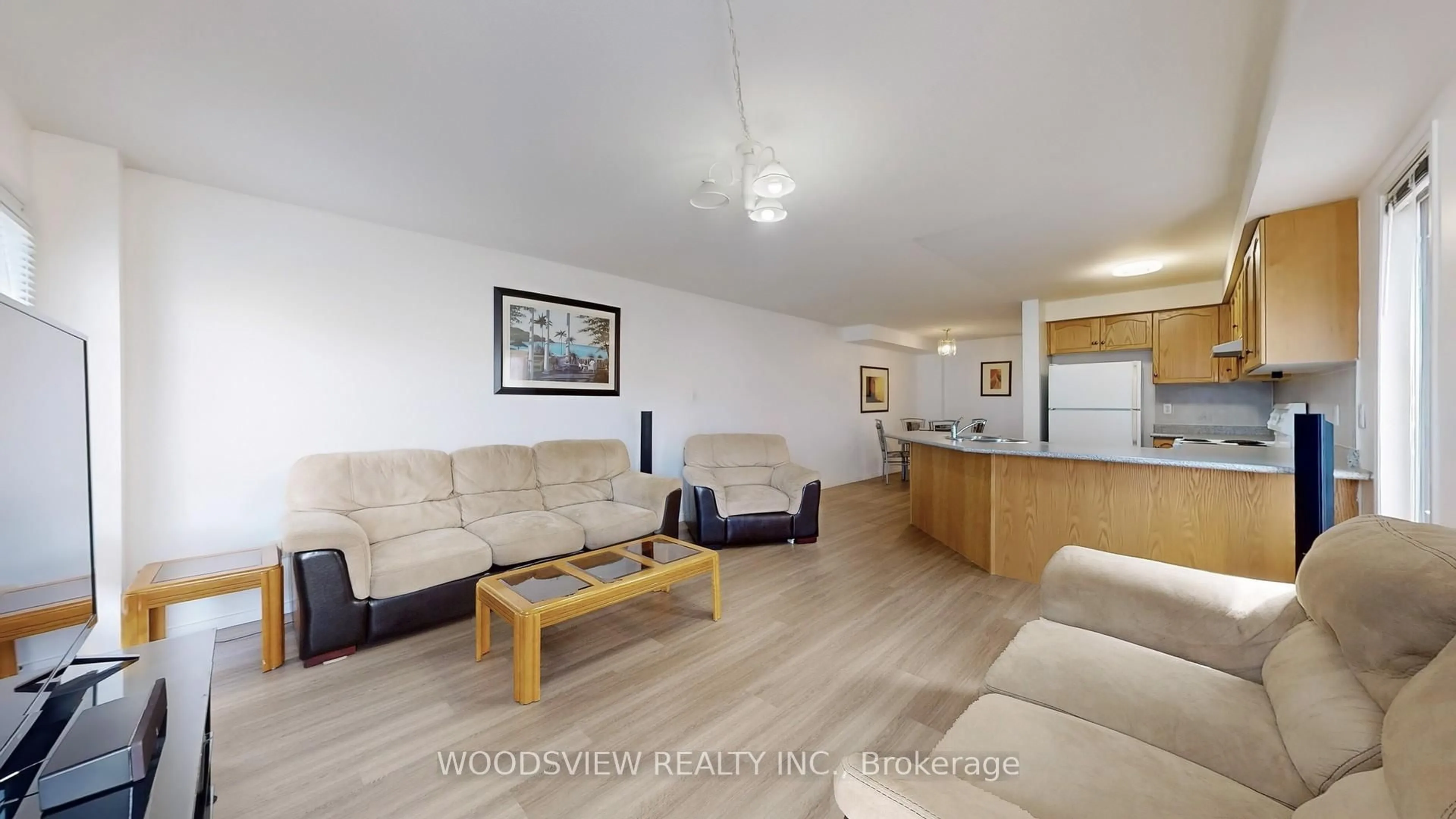 Living room with furniture, wood/laminate floor for 1171 Foxglove Pl, Mississauga Ontario L5V 2N1