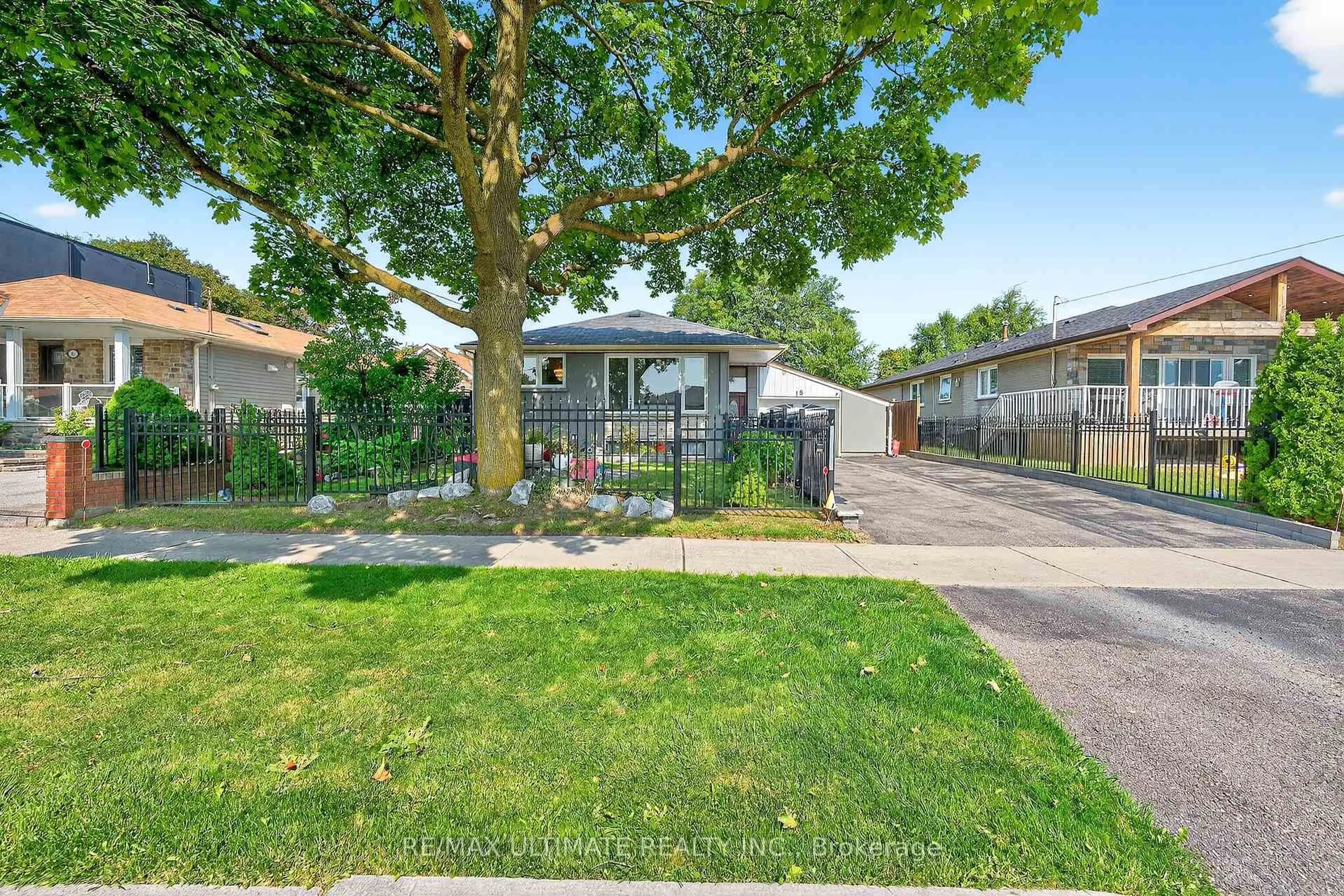 A pic from outside/outdoor area/front of a property/back of a property/a pic from drone, street for 18 Courtwright Rd, Toronto Ontario M9C 4B4