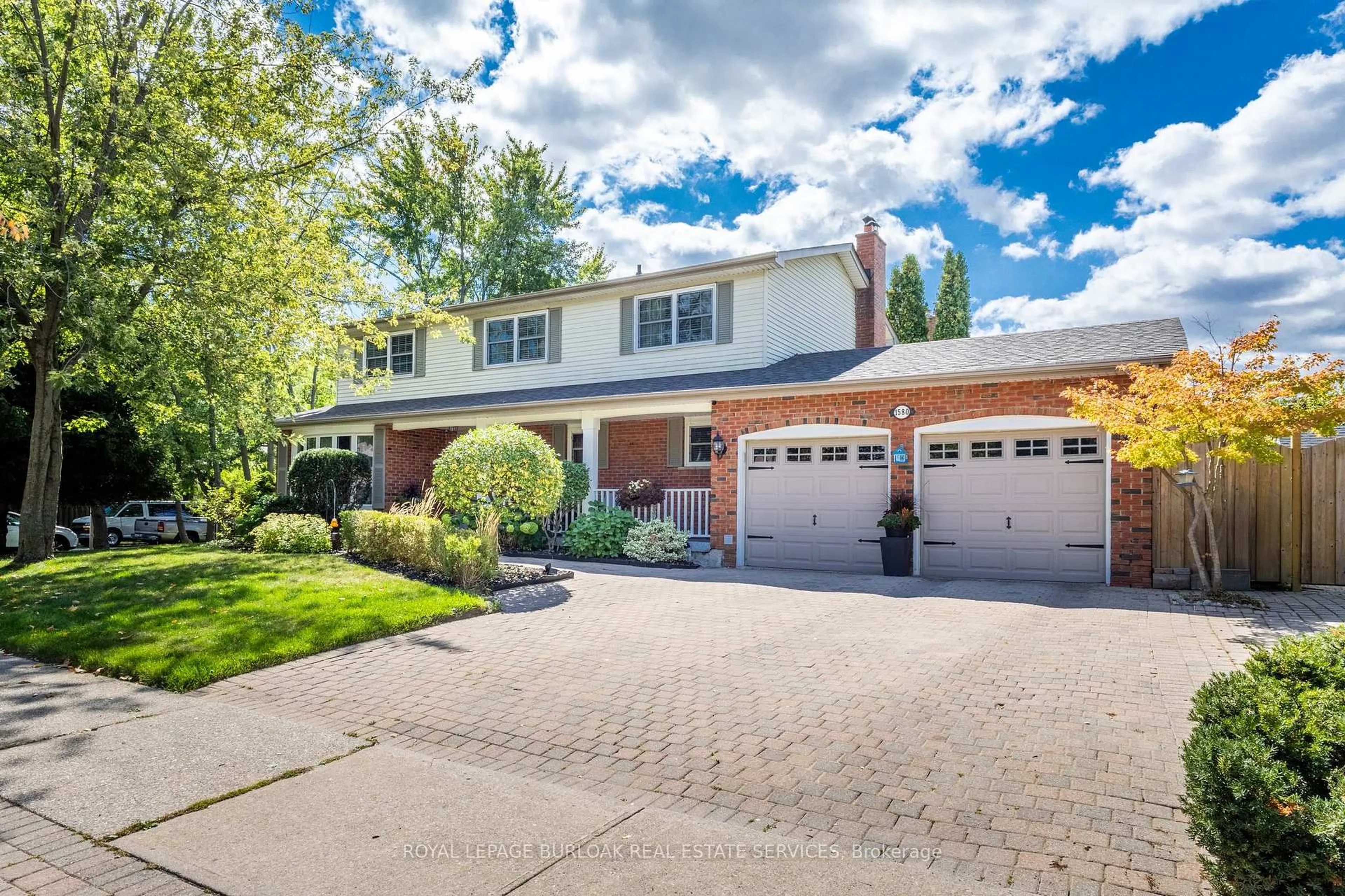 Home with brick exterior material, street for 1580 Woodeden Dr, Mississauga Ontario L5H 3S5