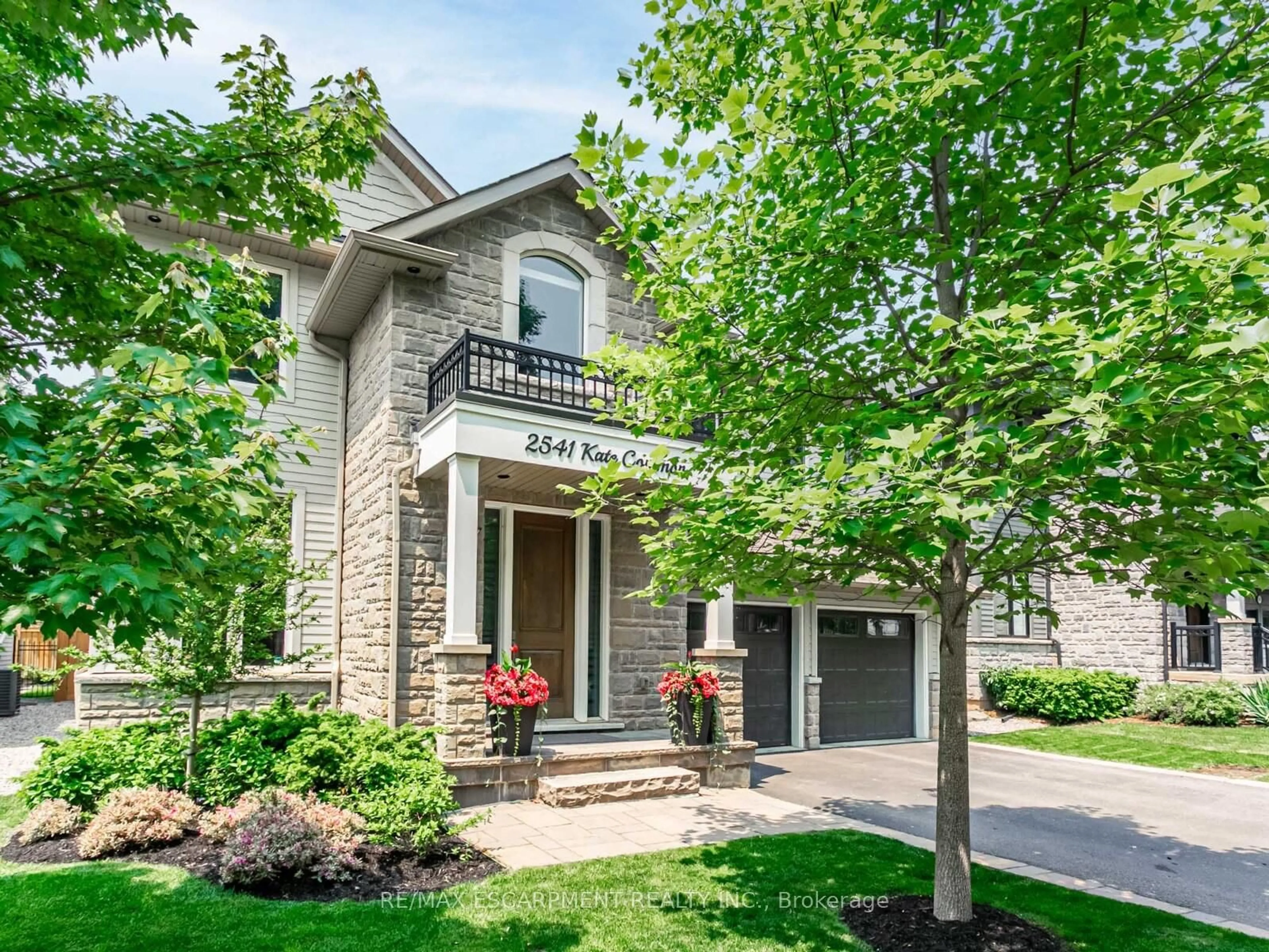Home with brick exterior material, street for 2541 Kate Common, Oakville Ontario L6L 0E9