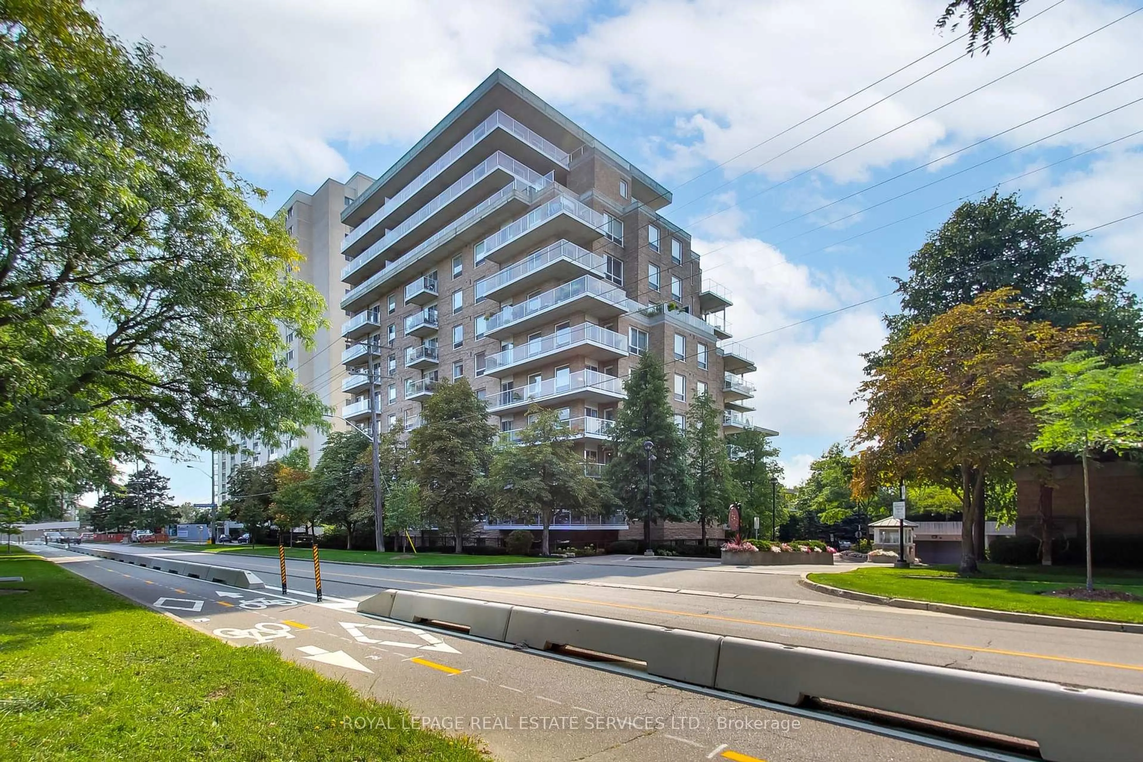 A pic from outside/outdoor area/front of a property/back of a property/a pic from drone, street for 350 Mill Rd #706, Toronto Ontario M9C 5R7