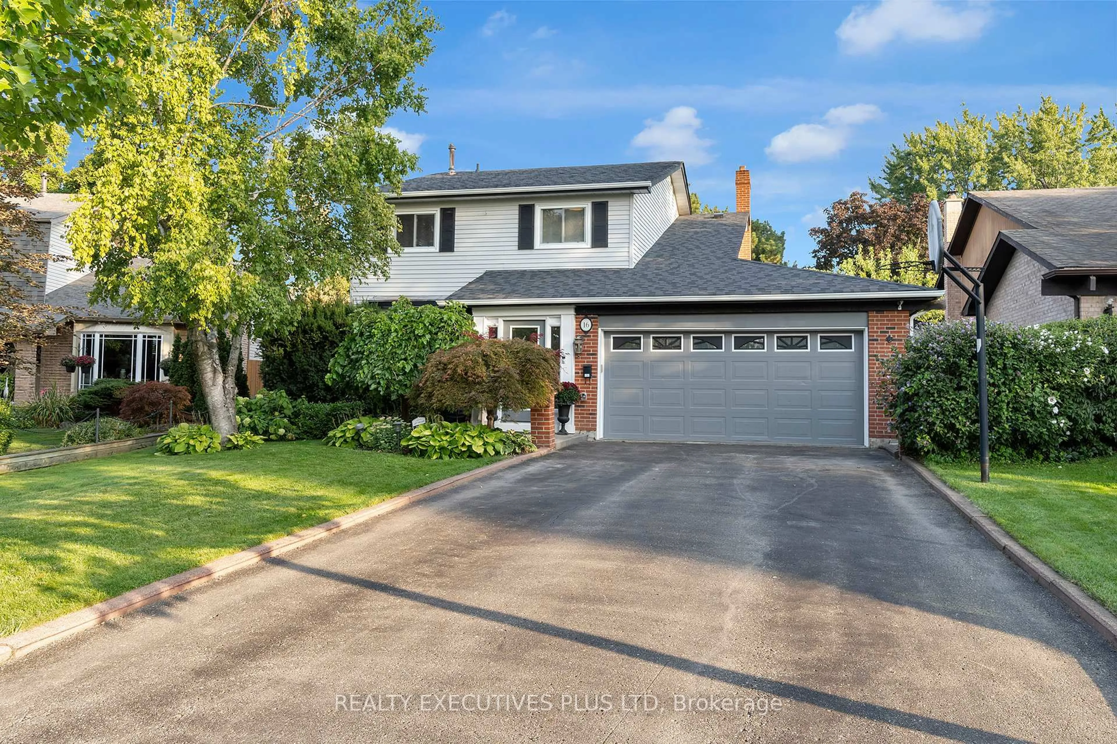 Home with brick exterior material, street for 16 Melita Pl, Brampton Ontario L6S 2Z3