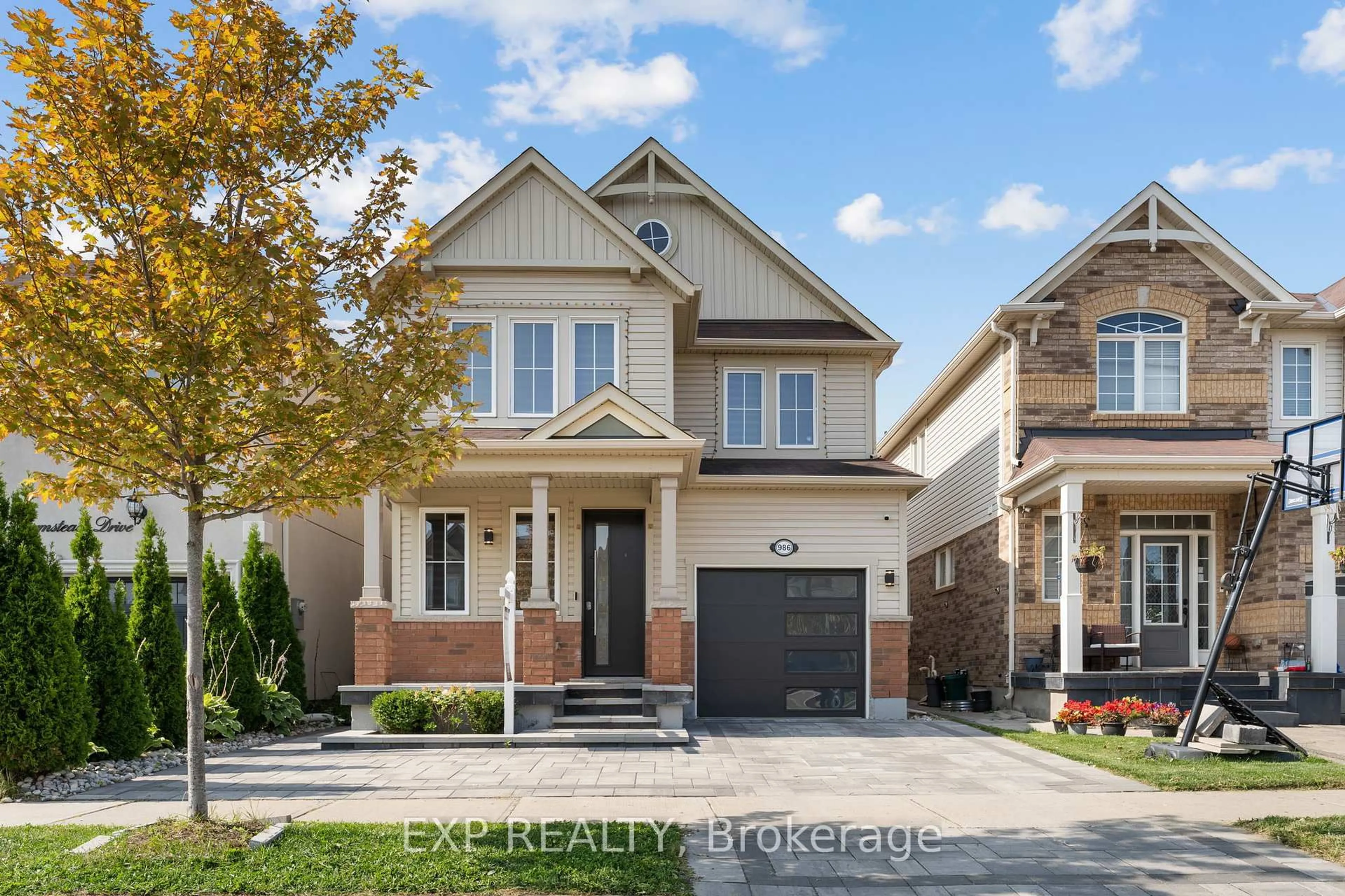 Home with brick exterior material, street for 986 Farmstead Dr, Milton Ontario L9T 8J1