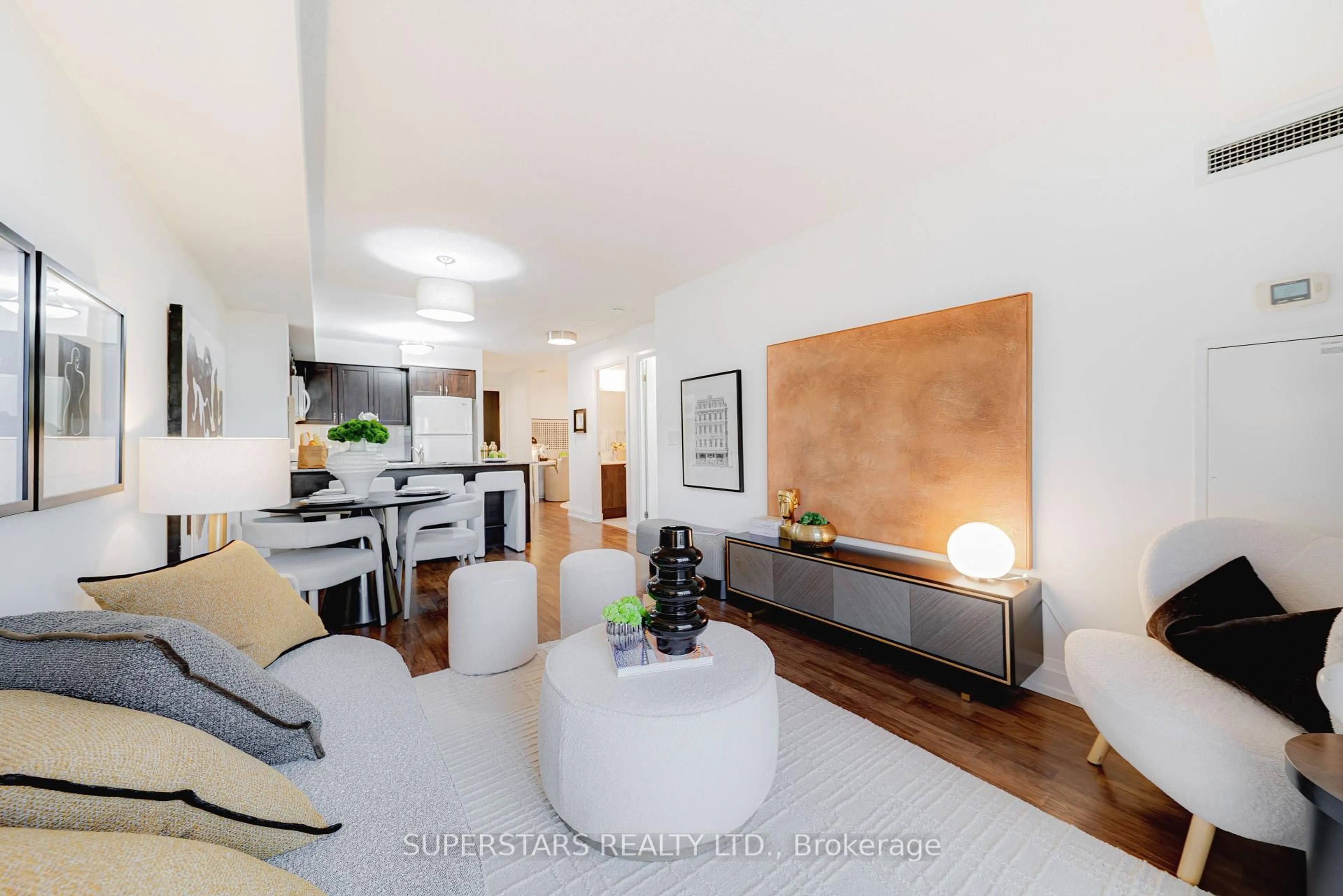 Living room with furniture, wood/laminate floor for 55 De Boers Dr #502, Toronto Ontario M3J 0G5
