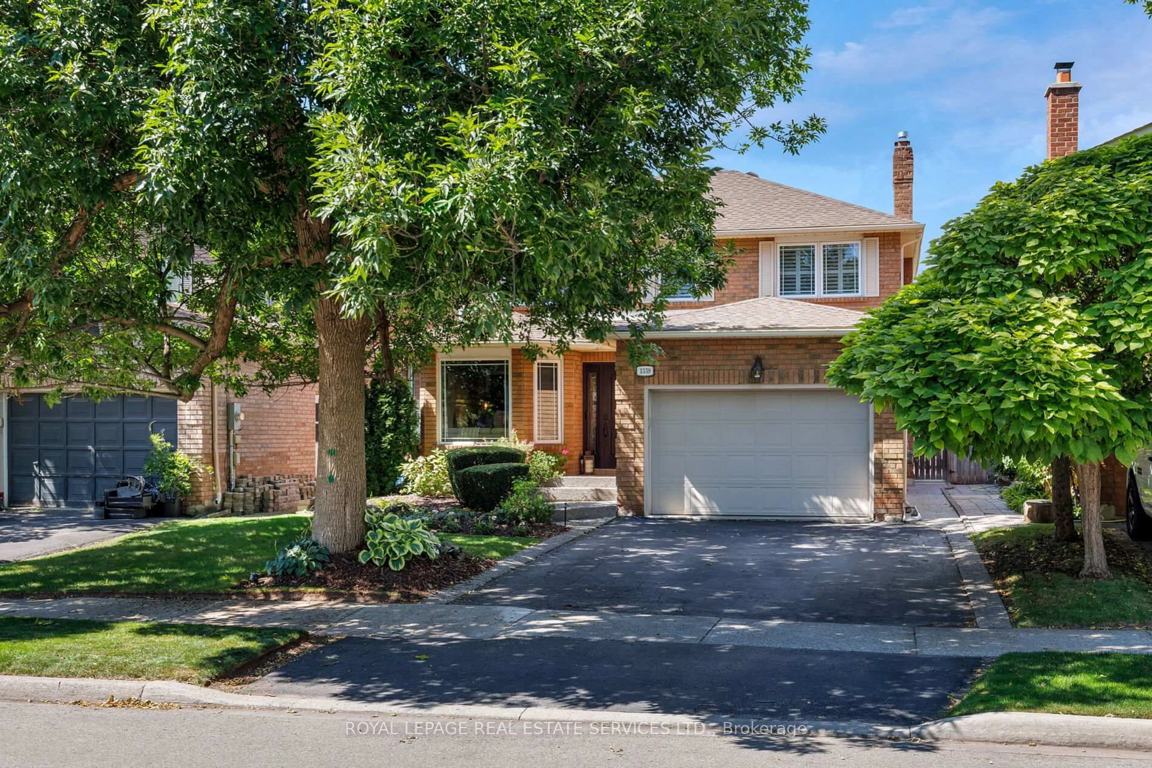 Home with brick exterior material, street for 1559 Stoneybrook Tr, Oakville Ontario L6M 2R4