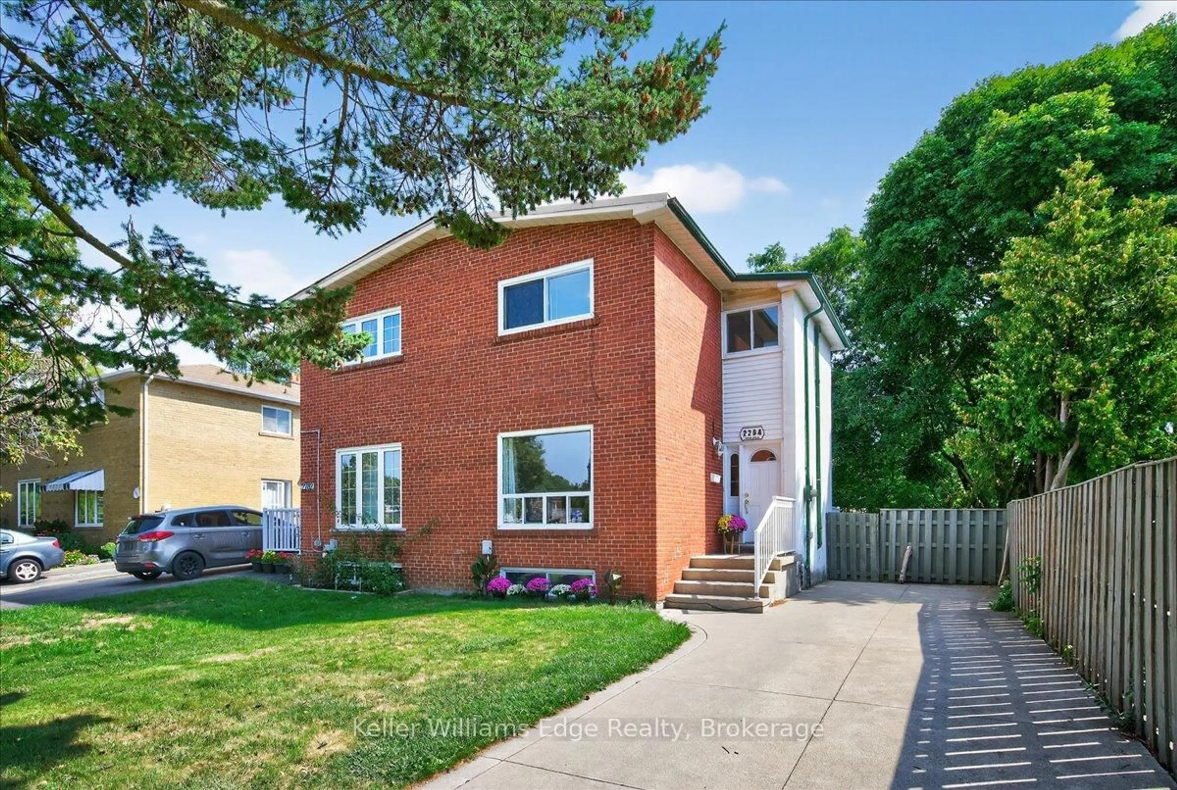 Home with brick exterior material, street for 2284 Brookhurst Rd, Mississauga Ontario L5J 1P9