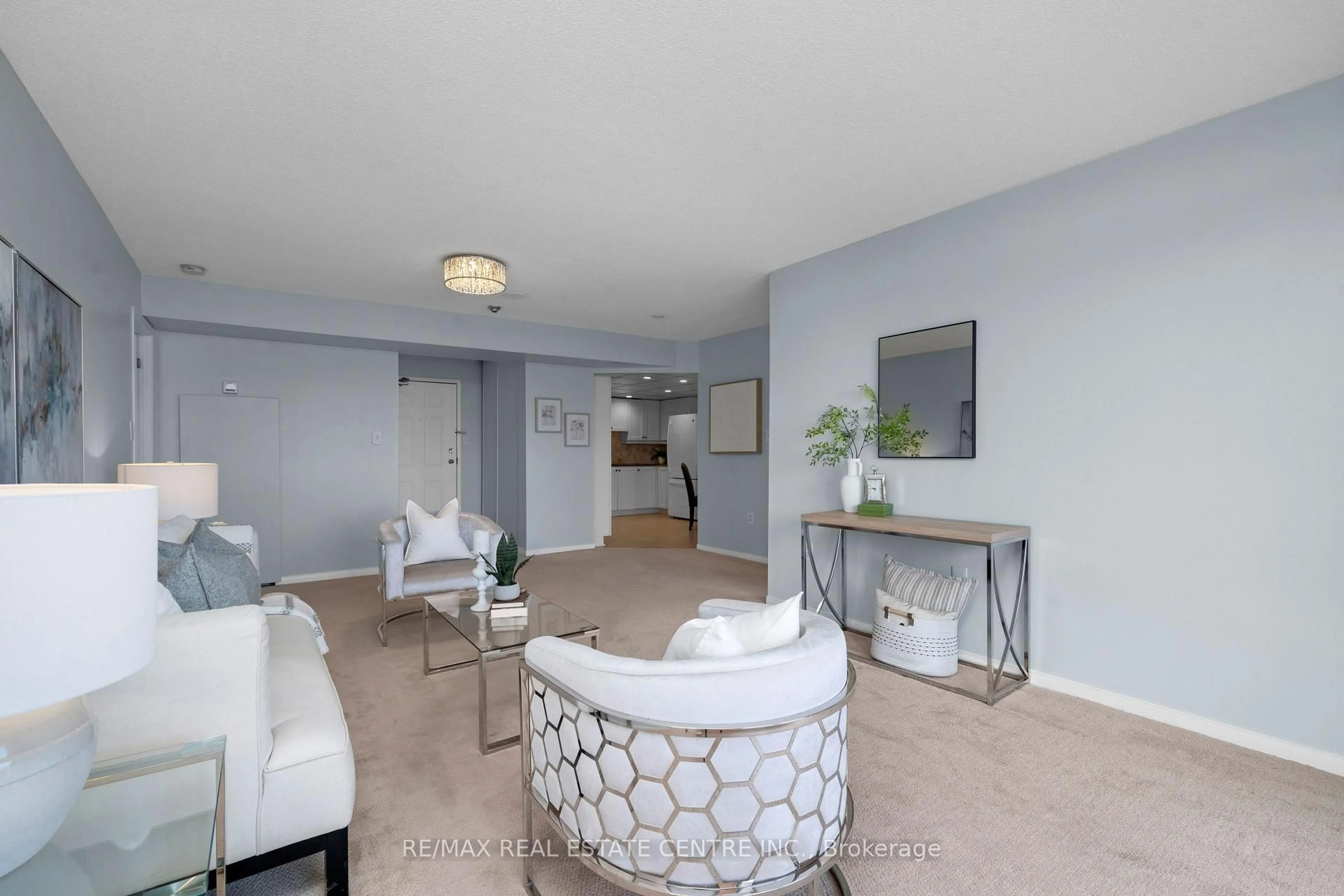 Living room with furniture, unknown for 20 McFarlane Dr #709, Halton Hills Ontario L7G 5J8