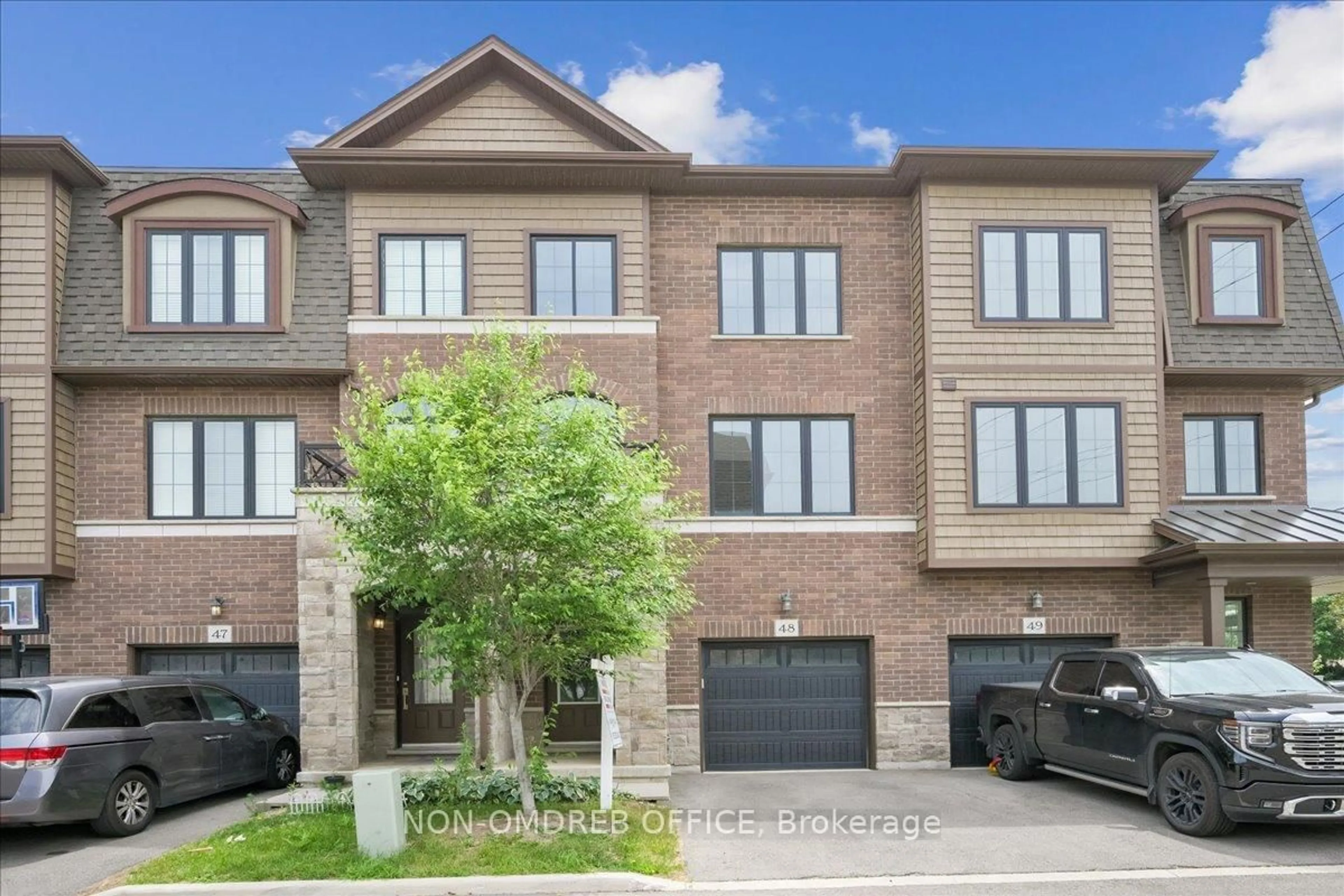 Home with brick exterior material, street for 445 Ontario St #49, Milton Ontario L9T 9K3