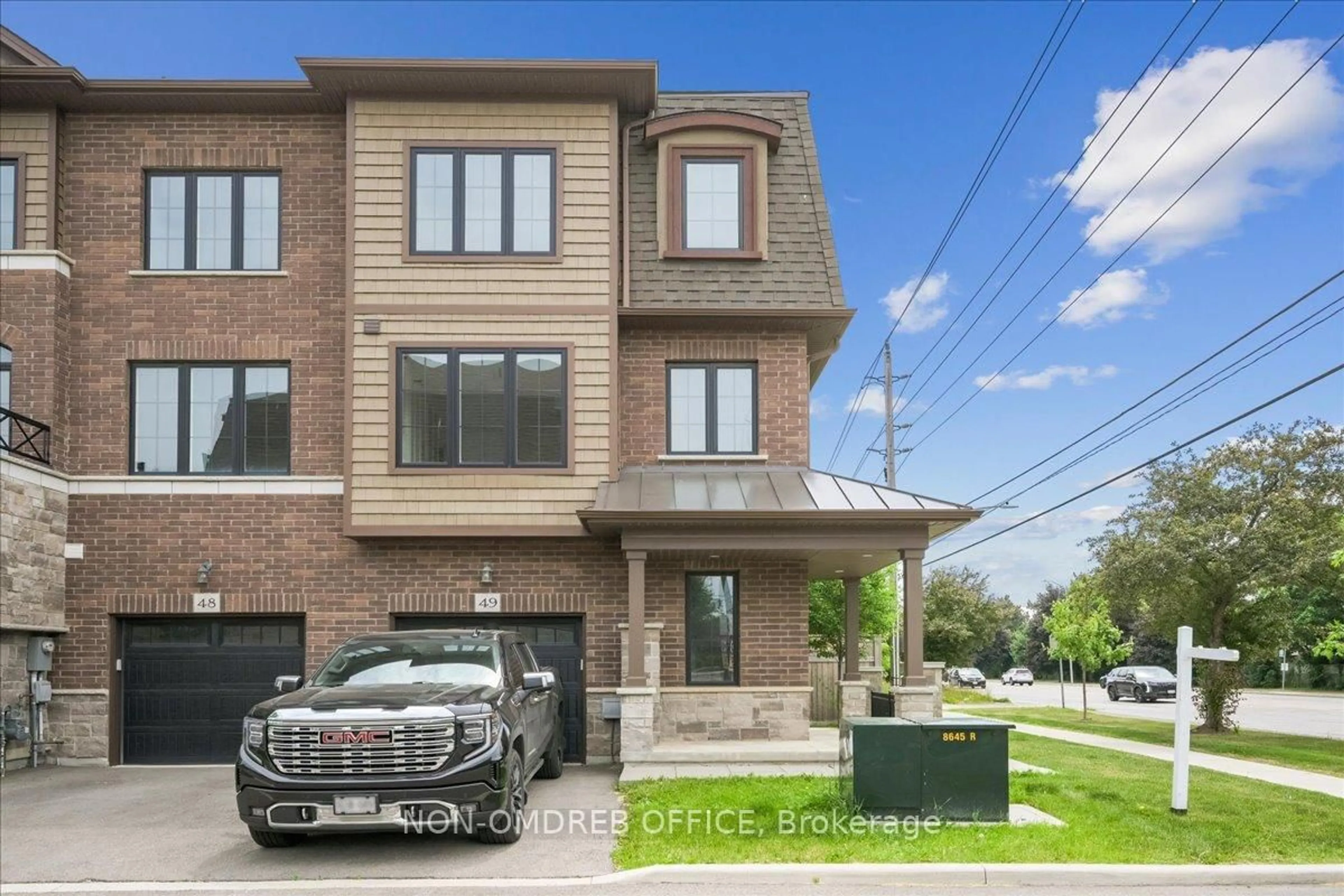 Home with brick exterior material, street for 445 Ontario St #49, Milton Ontario L9T 9K3