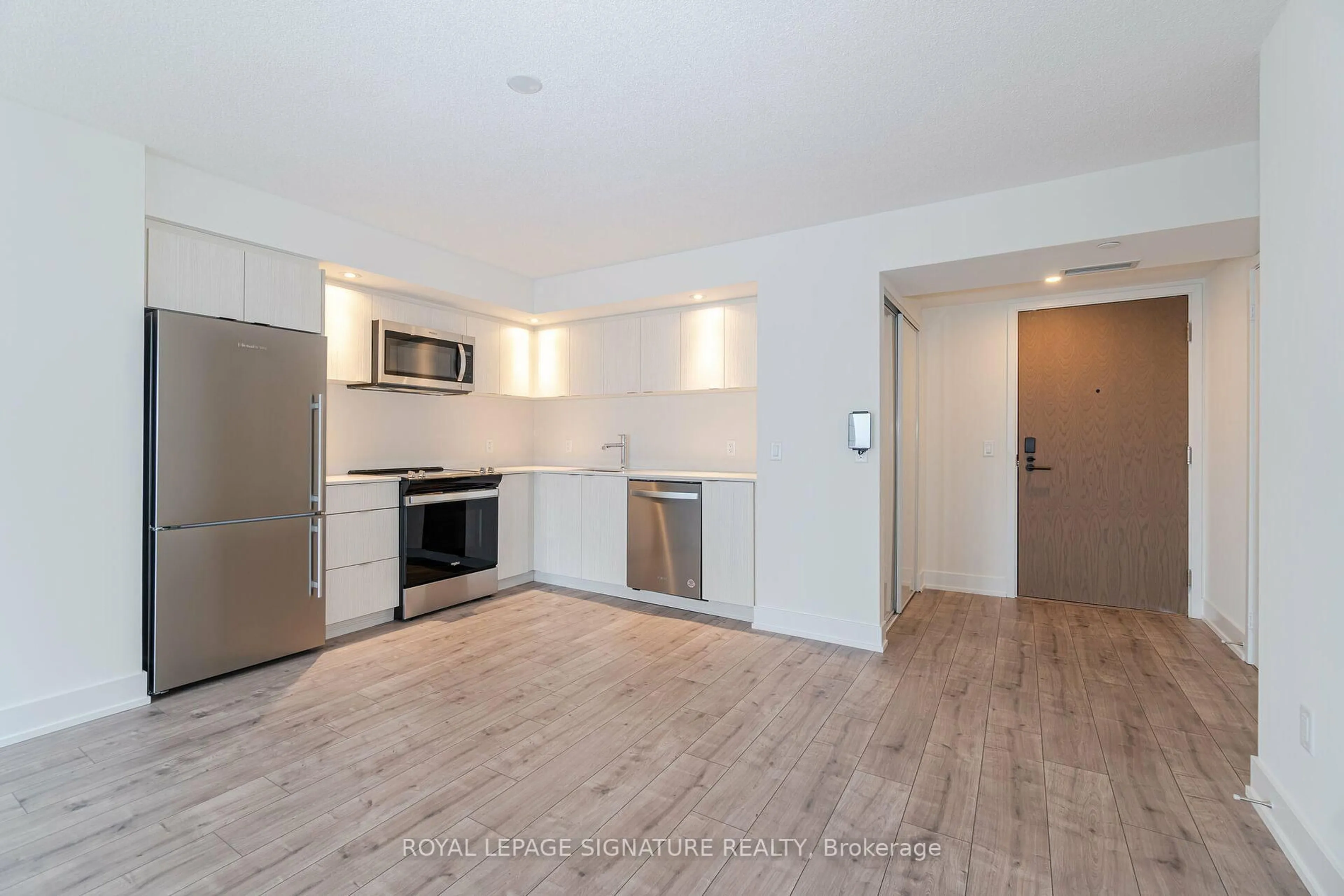 Open concept kitchen, unknown for 10 Eva Rd #403, Toronto Ontario M9C 0B3