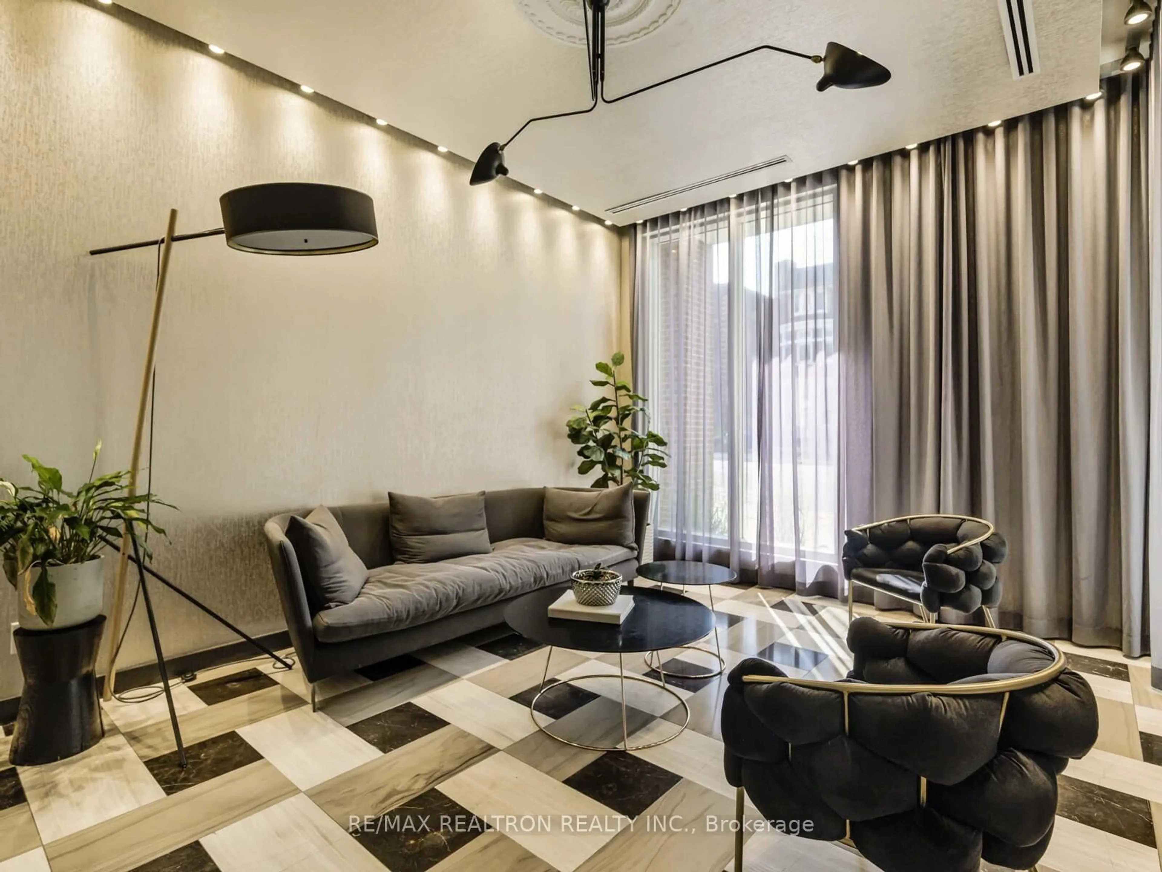 Living room with furniture, cement floor for 1638 Bloor St #601, Toronto Ontario M6P 0A6