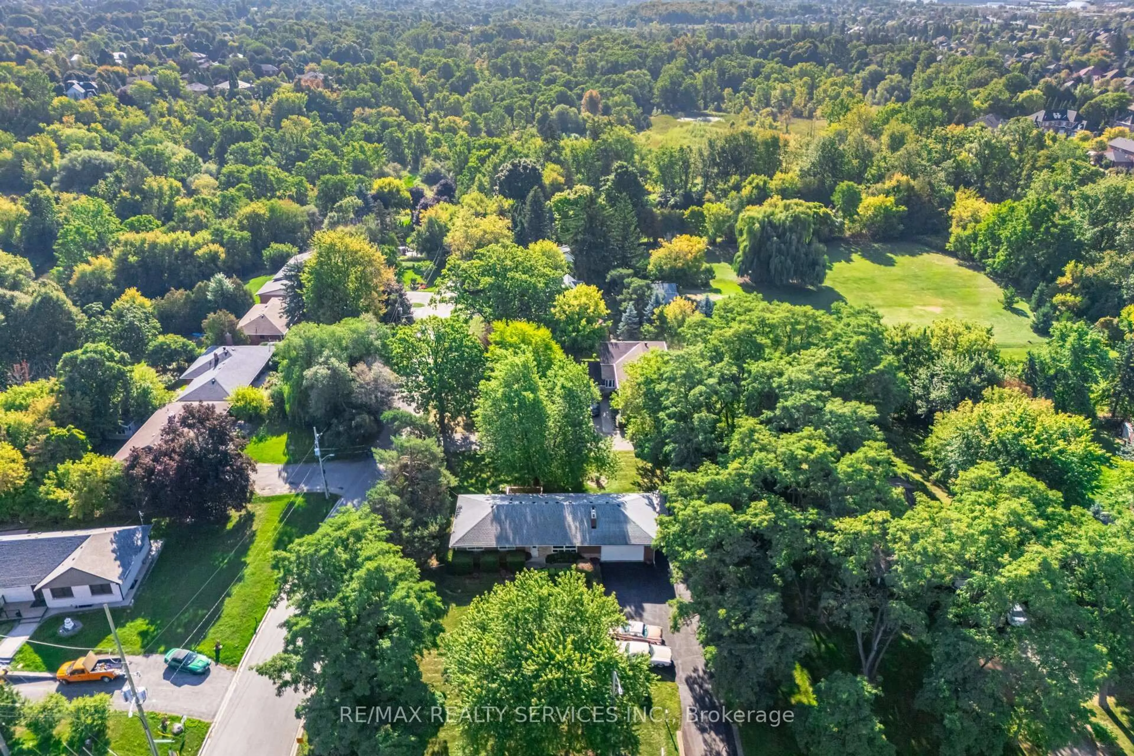 A pic from outside/outdoor area/front of a property/back of a property/a pic from drone, forest/trees view for 3173 Mayfield Rd, Brampton Ontario L6Z 4P9