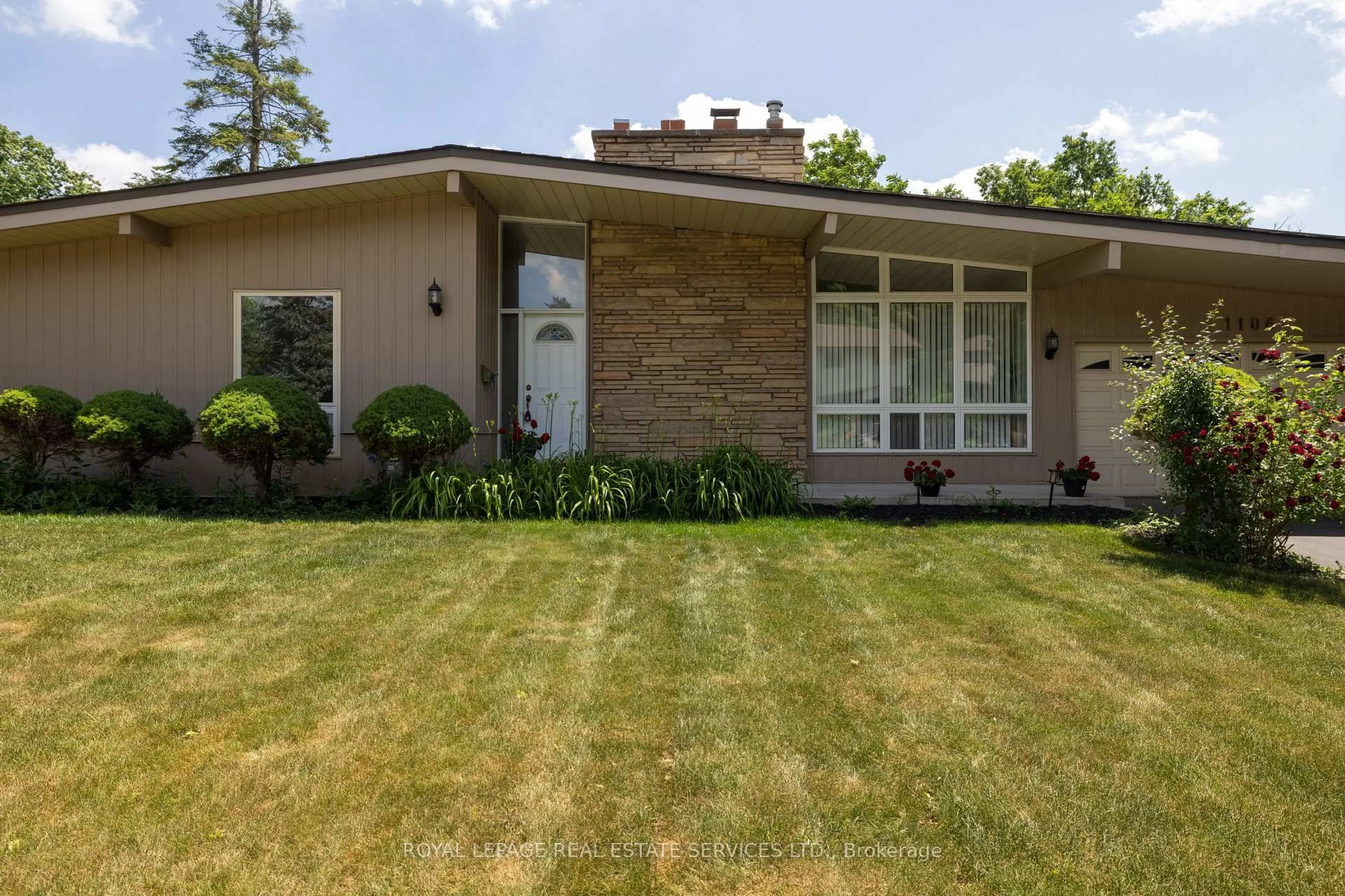 Home with brick exterior material, street for 1106 Falgarwood Dr, Oakville Ontario L6H 1N9