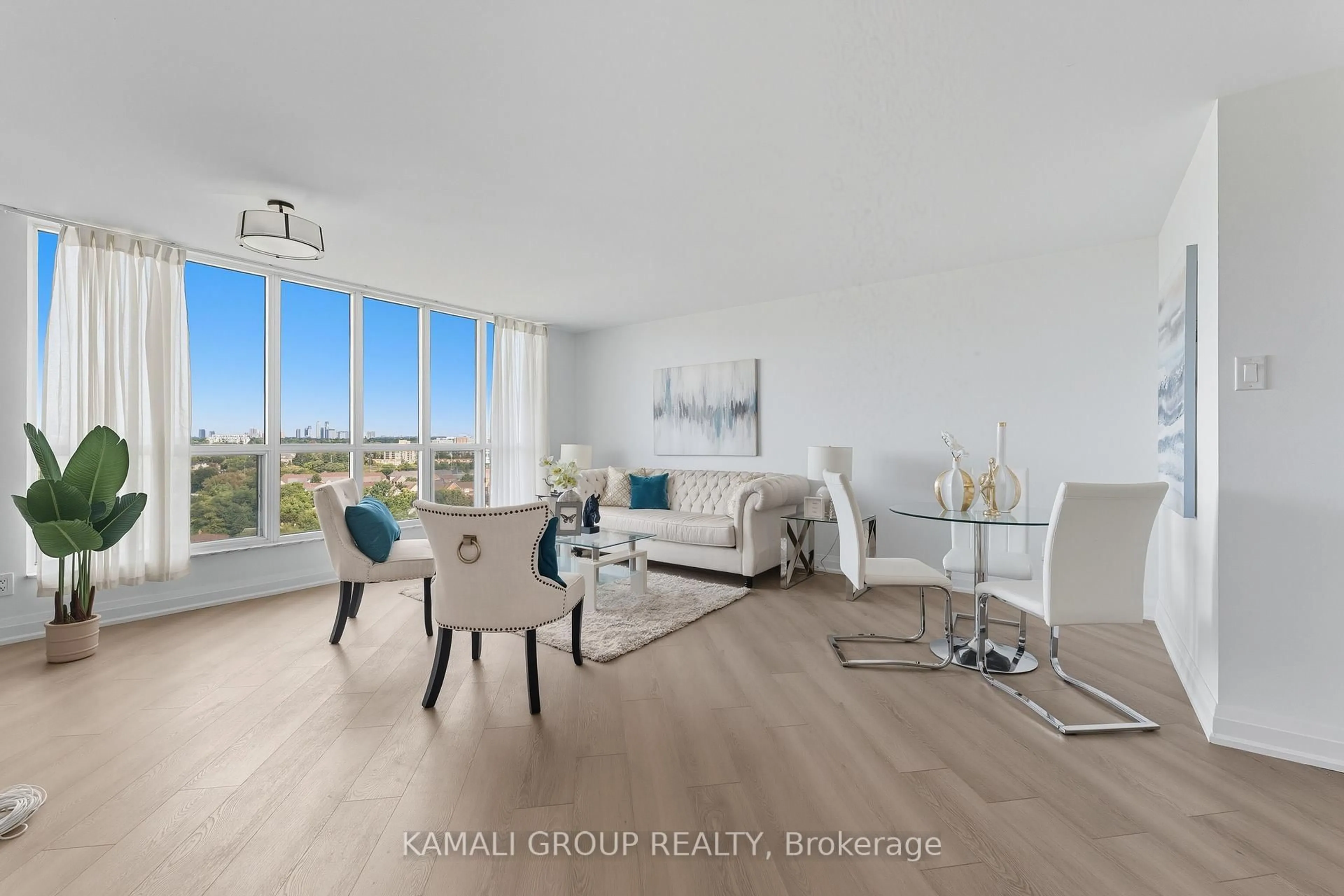 Living room with furniture, wood/laminate floor for 2285 Lake Shore Blvd #1405, Toronto Ontario M8V 3X9