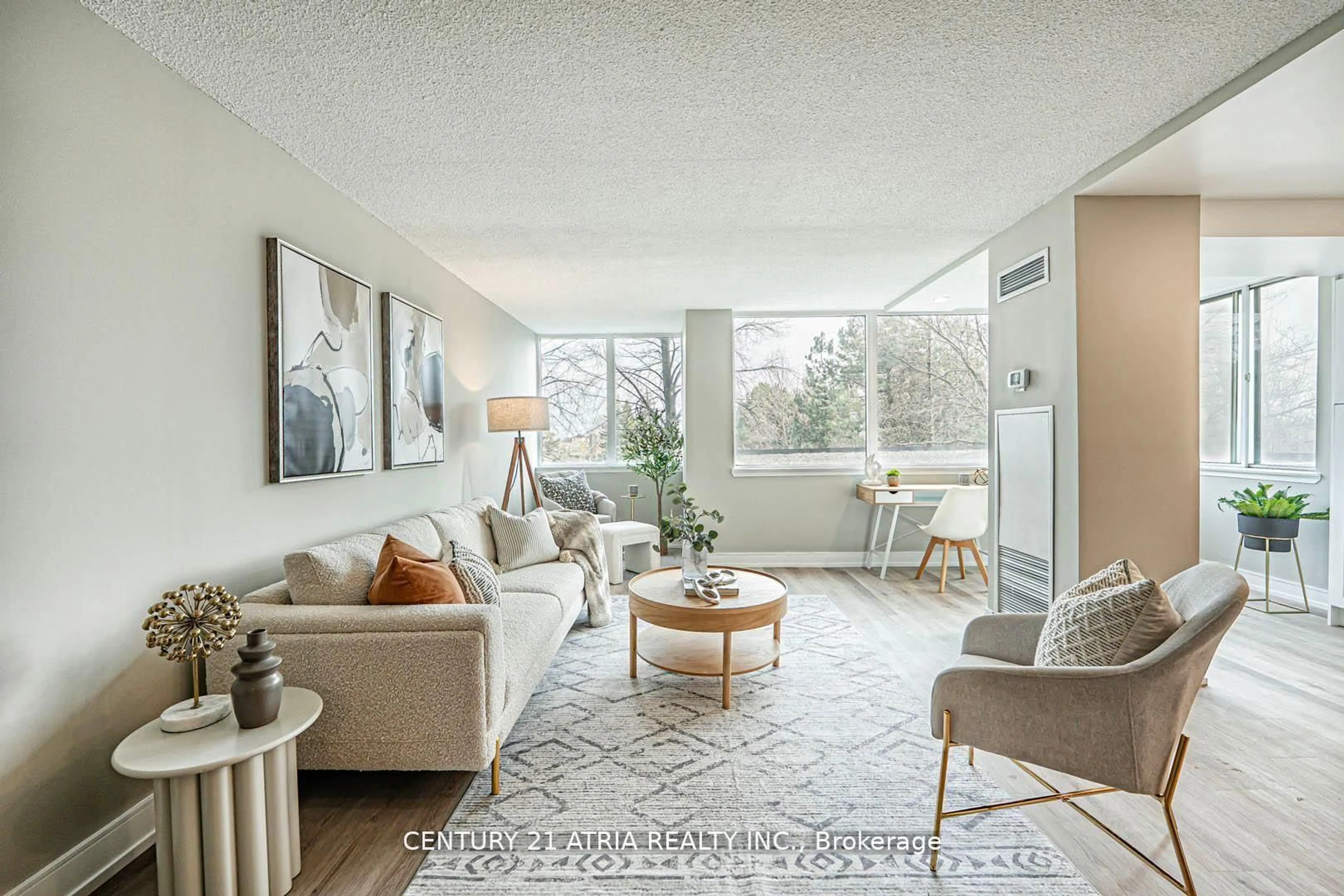 Living room with furniture, unknown for 350 Webb Dr #206, Mississauga Ontario L5B 3N6