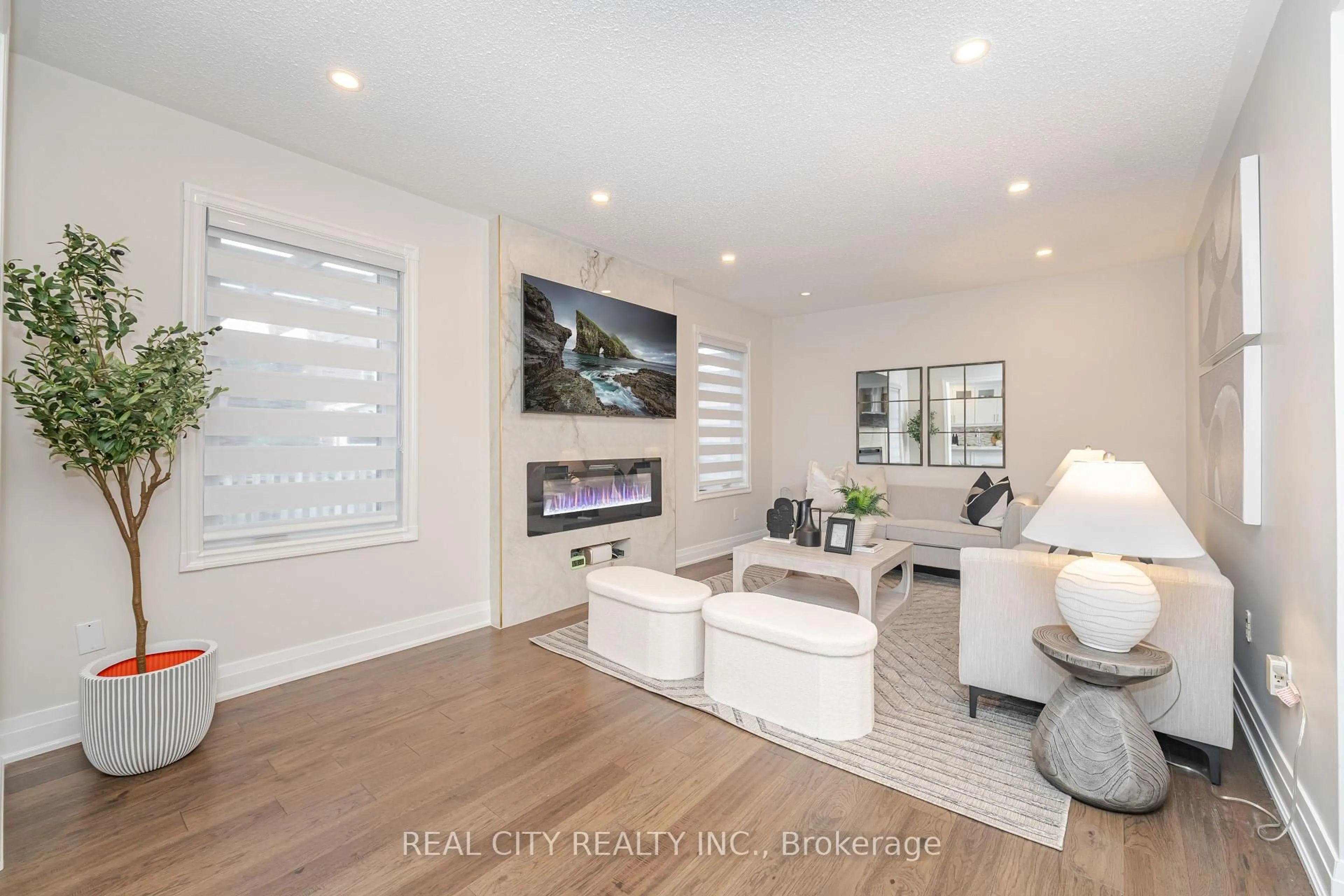 Living room with furniture, wood/laminate floor for 36 Jeremy Pl, Brampton Ontario L6S 5K5
