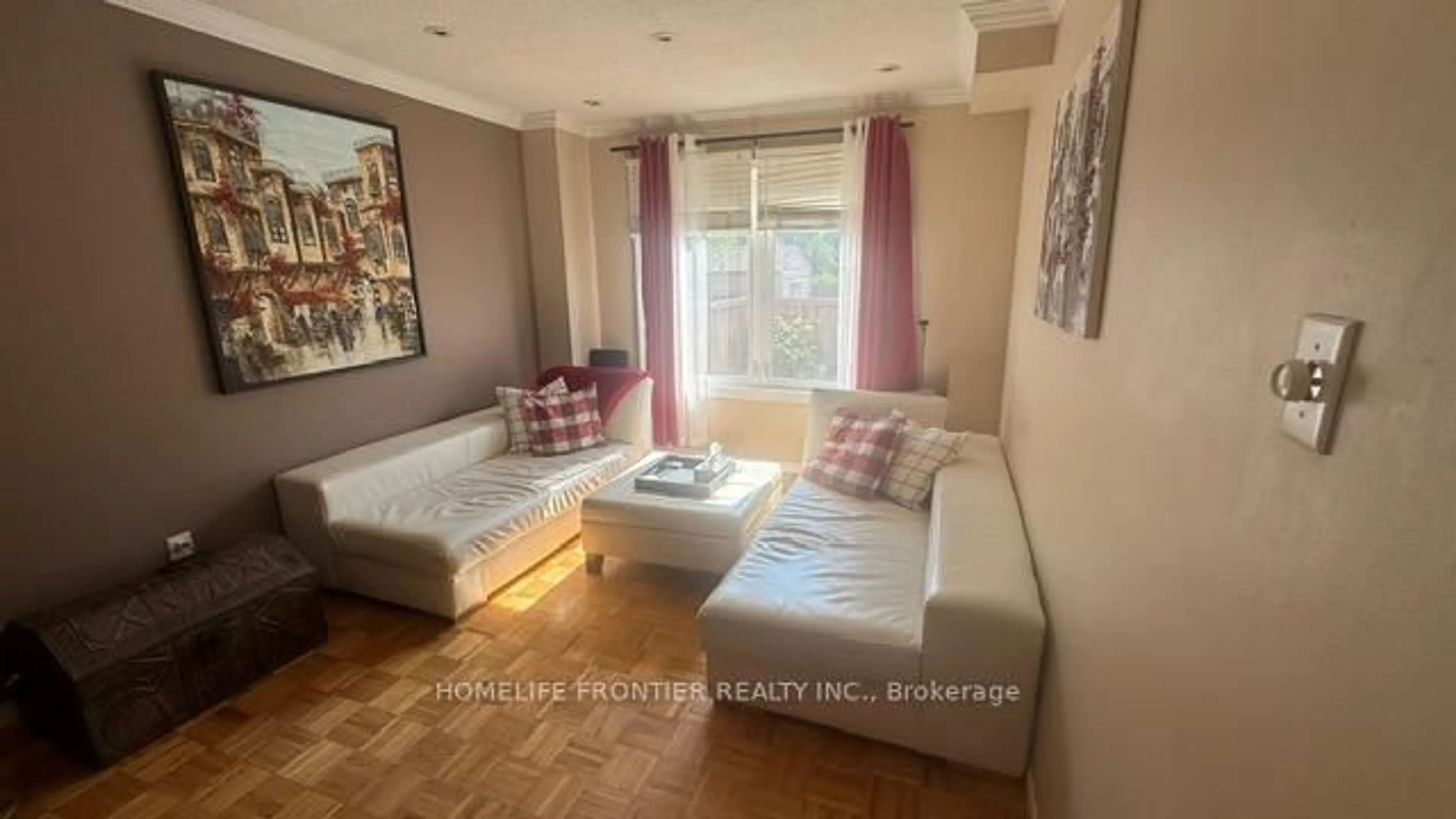 Living room with furniture, wood/laminate floor for 30 Gatesgill St, Brampton Ontario L6X 3T2