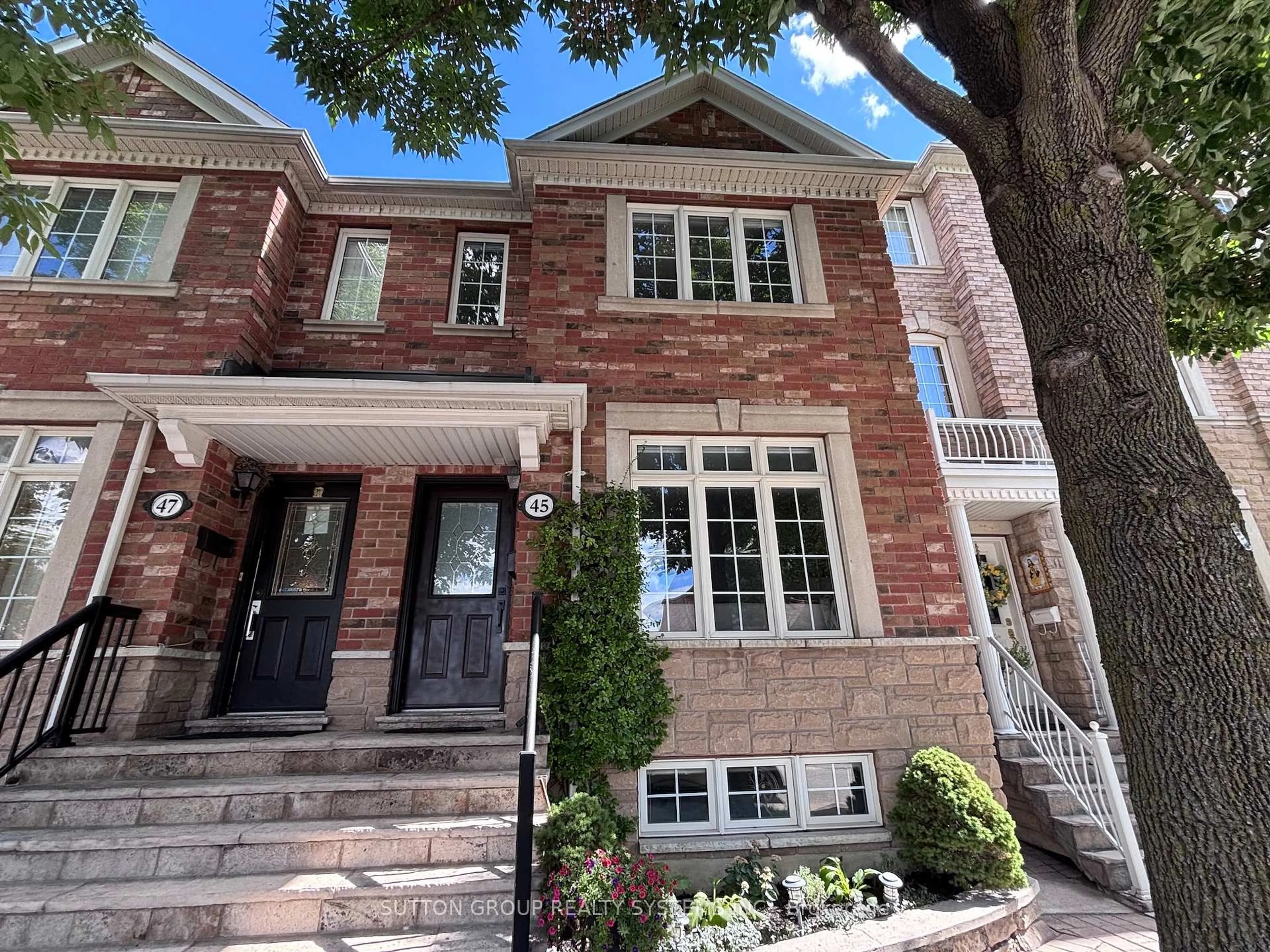 Home with brick exterior material, street for 45 Algarve Cres, Toronto Ontario M6N 5E7