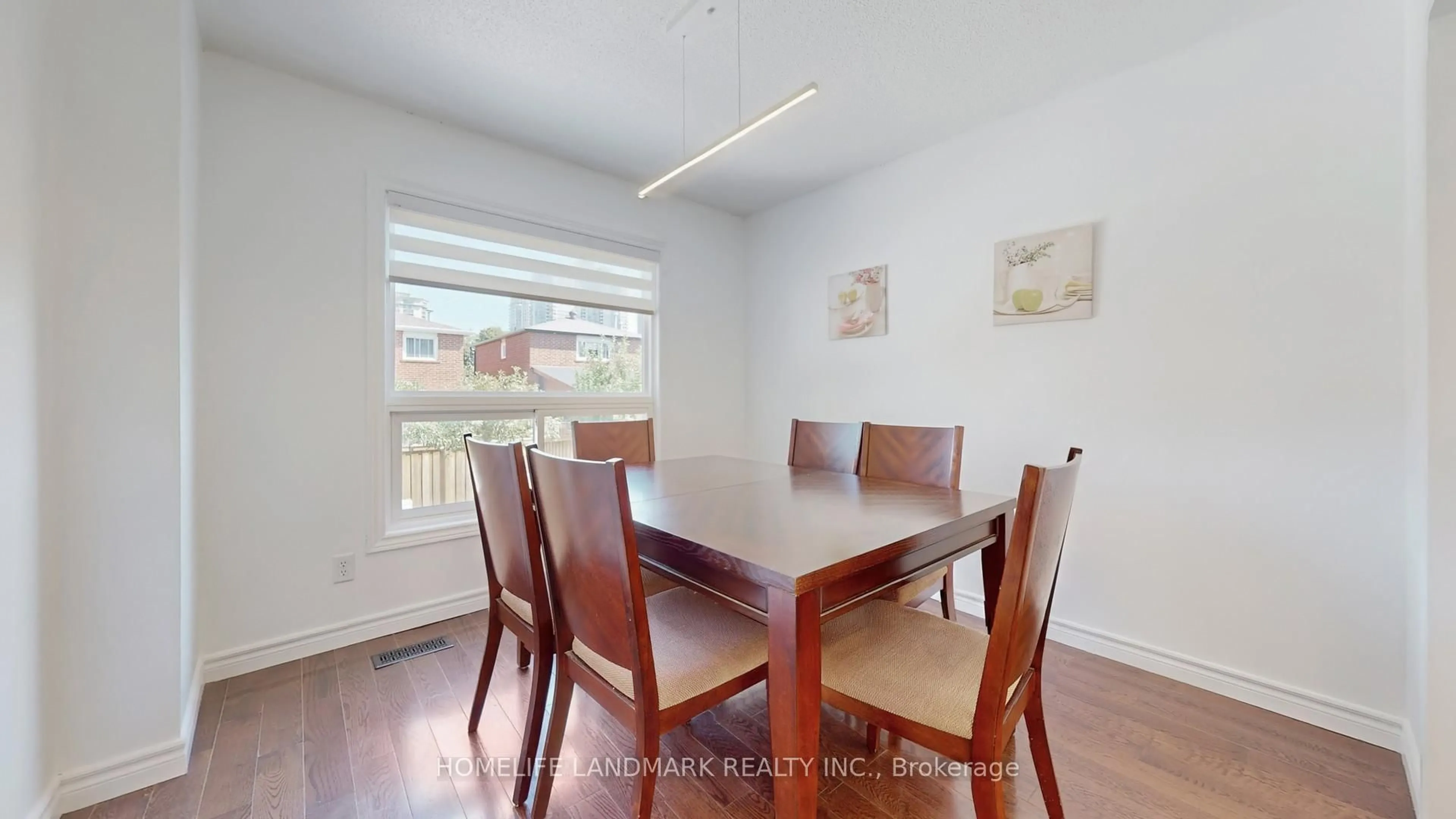 Dining room, wood/laminate floor for 373 Kingsbridge Garden Circ, Mississauga Ontario L5R 1K9
