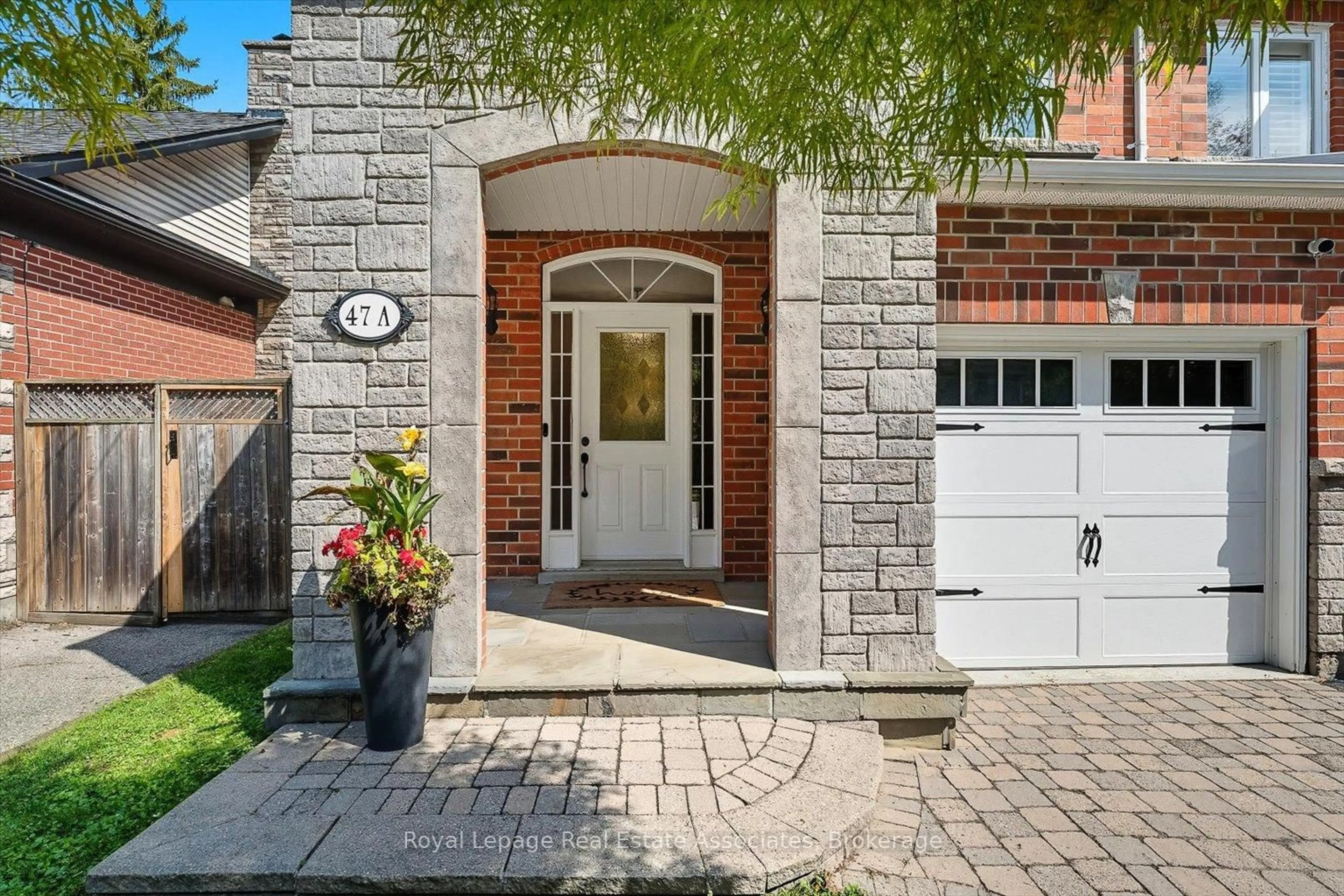 Home with brick exterior material, street for 47A Oakwood Ave, Mississauga Ontario L5G 3L9