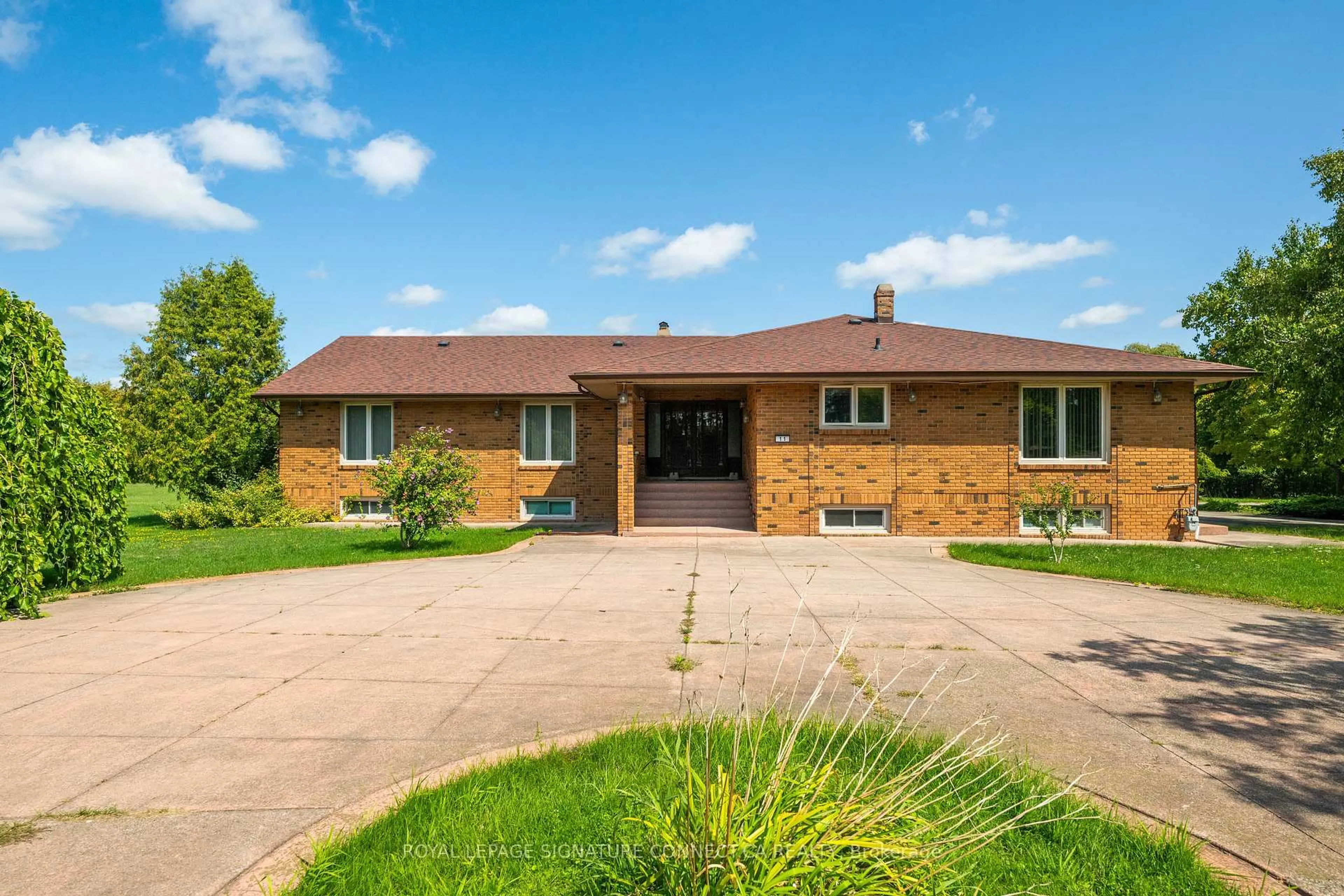 Home with brick exterior material, street for 11 Julian Dr, Brampton Ontario L6P 0L3