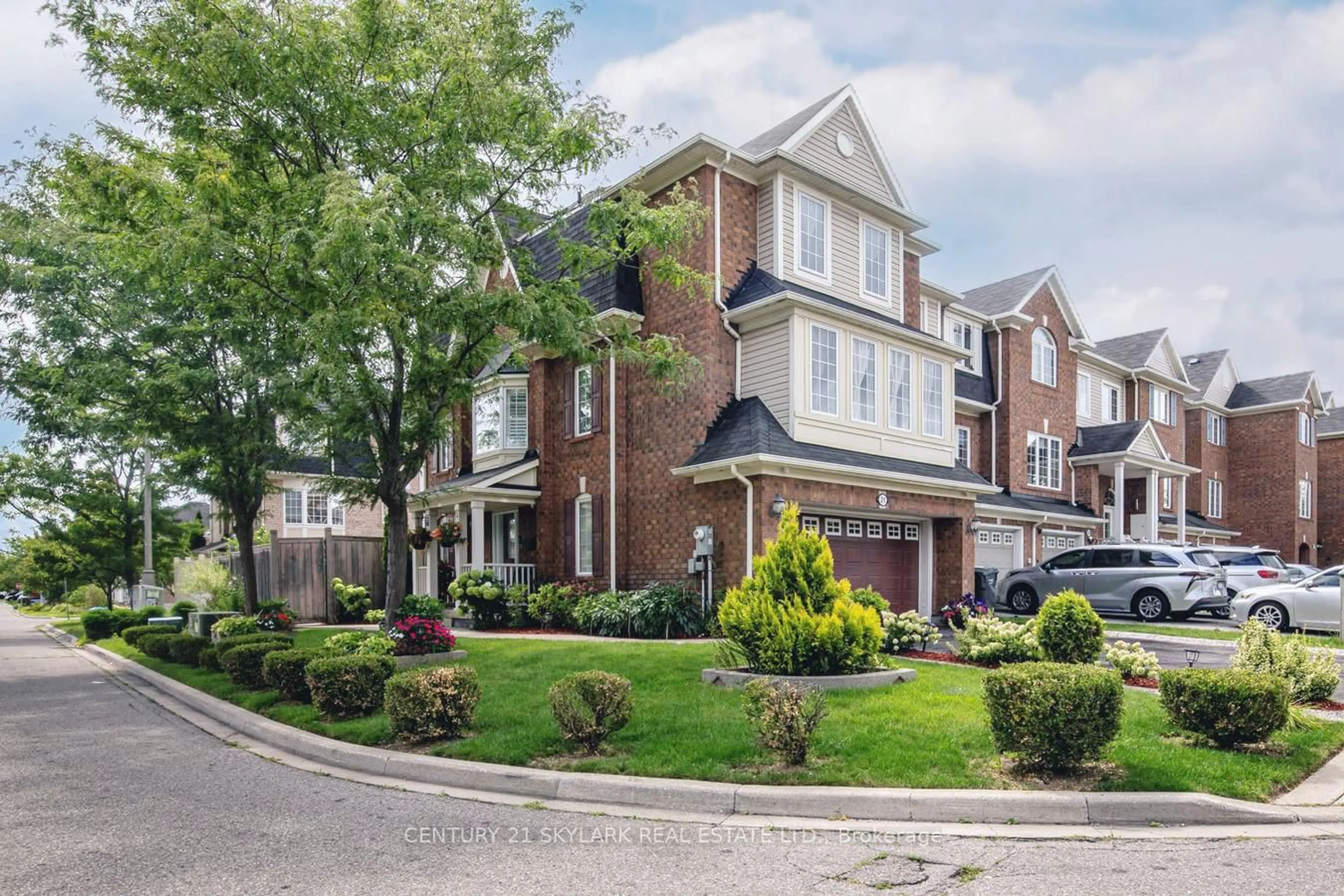 Home with brick exterior material, street for 21 Decker Hollow Circ, Brampton Ontario L6X 0K9