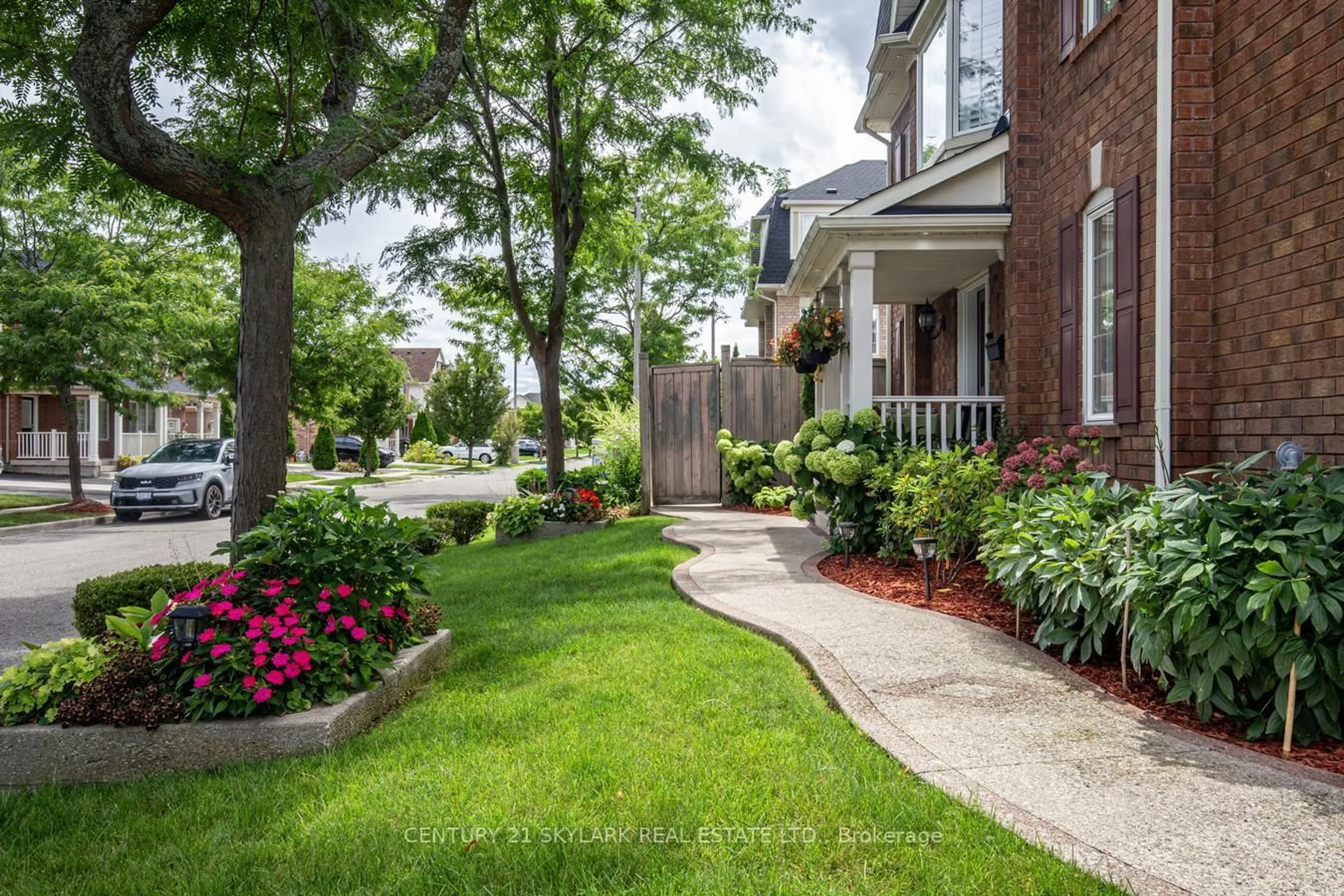 Home with brick exterior material, street for 21 Decker Hollow Circ, Brampton Ontario L6X 0K9