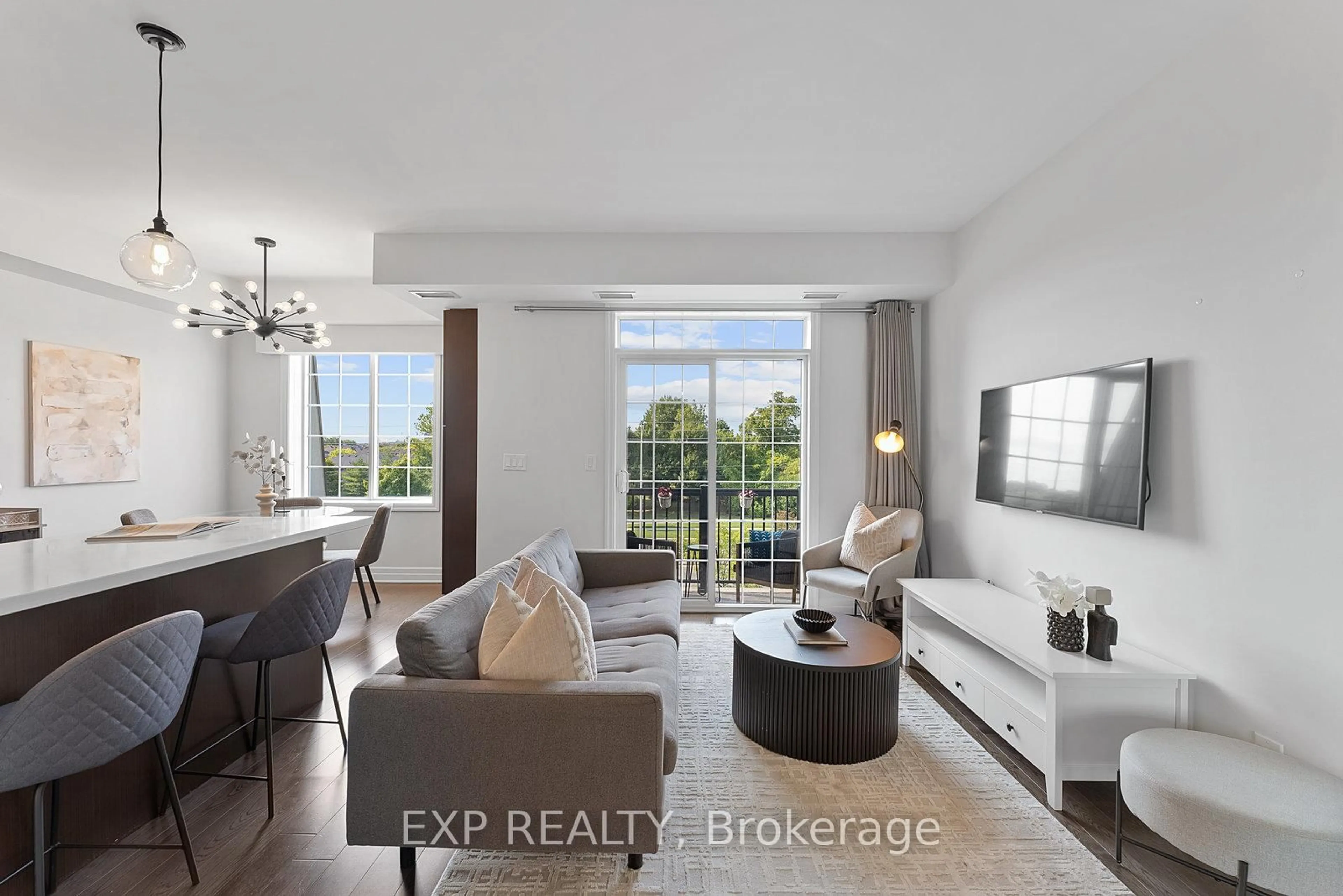 Living room with furniture, unknown for 2300 Upper Middle Rd #325, Oakville Ontario L6M 0T4