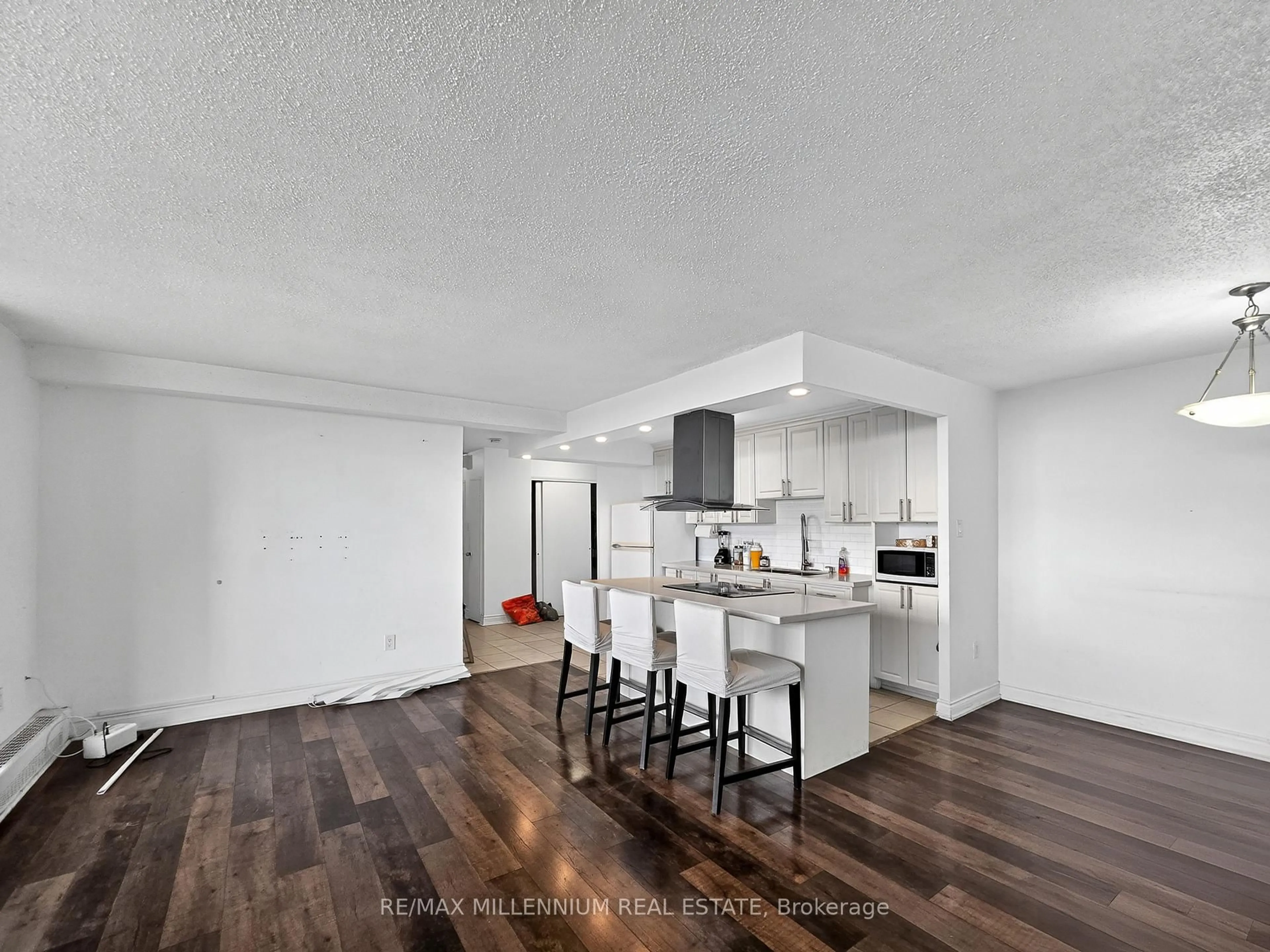 Open concept kitchen, wood/laminate floor for 2645 Kipling Ave #1811, Toronto Ontario M9V 3S6