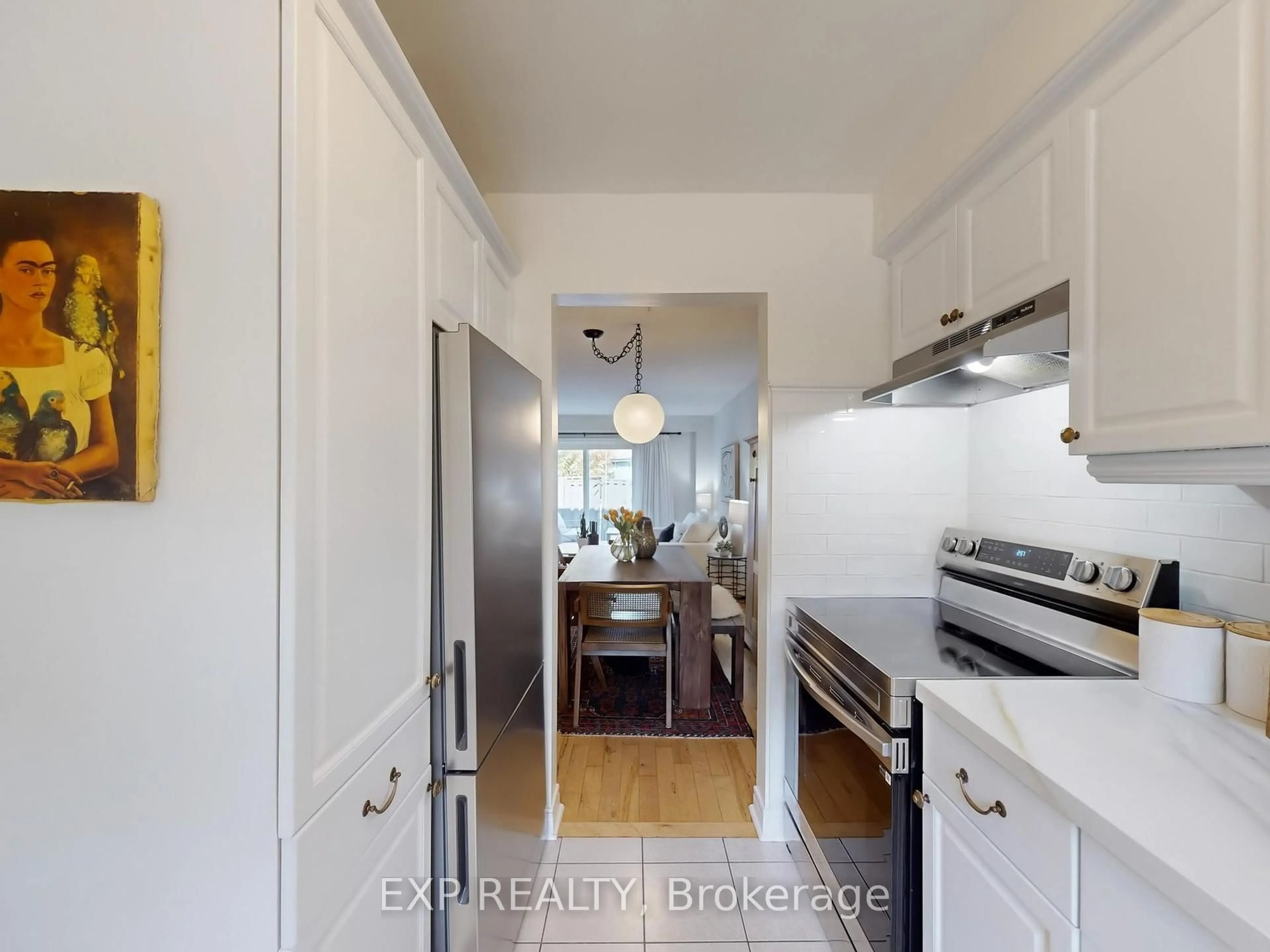 Kitchen with laundary machines, unknown for 6699 Falconer Dr #28, Mississauga Ontario L5N 2E3