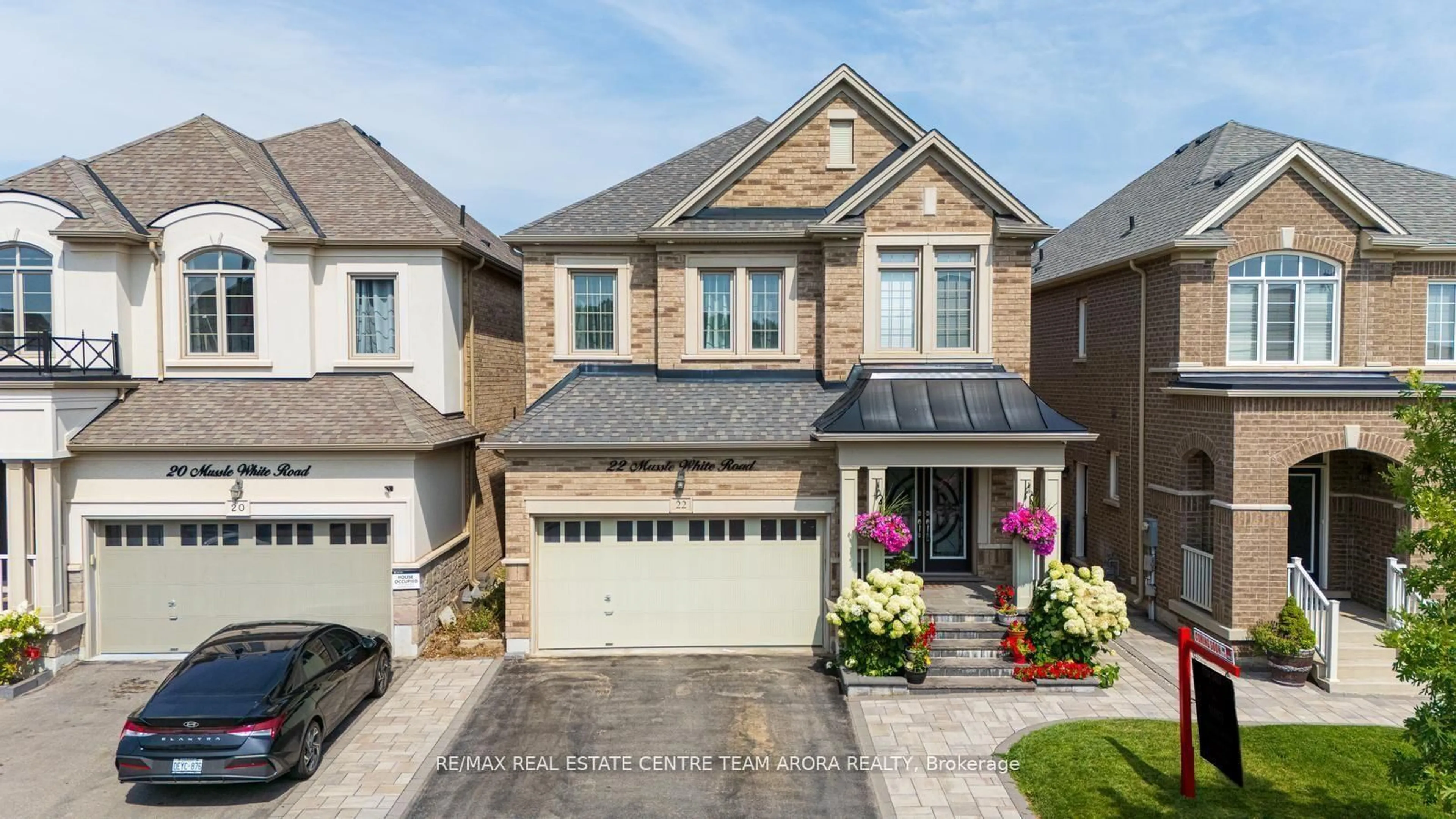 Home with brick exterior material, street for 22 Mussle White Rd, Brampton Ontario L6Y 6C3