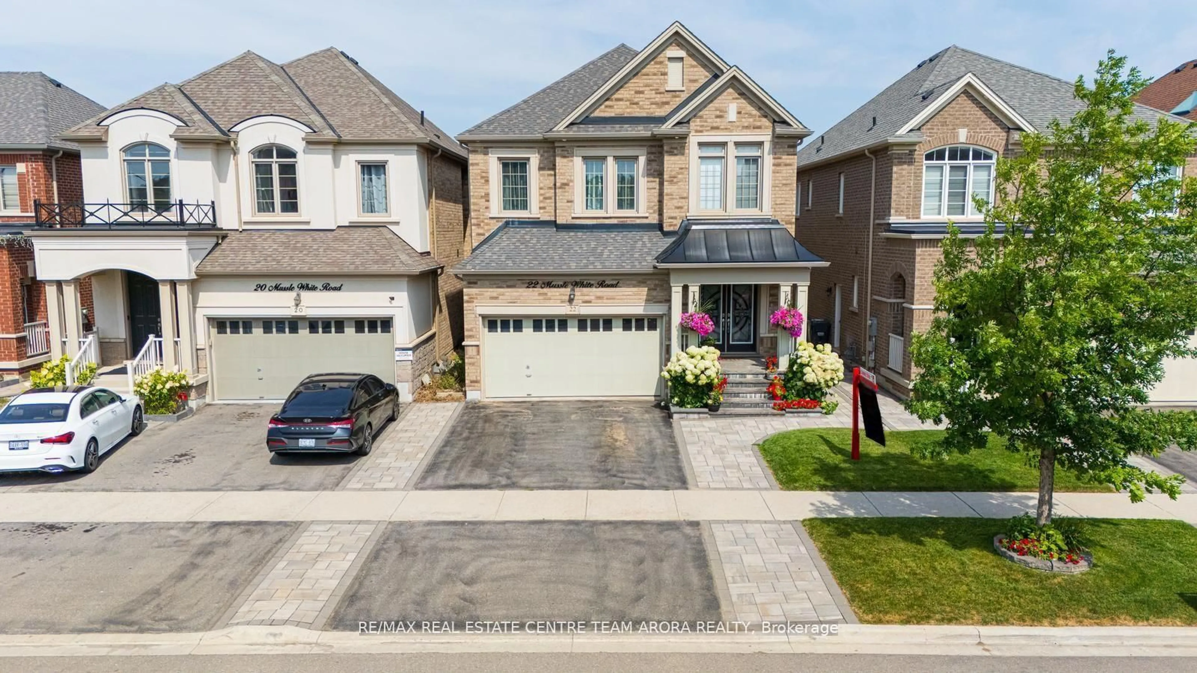 Home with brick exterior material, street for 22 Mussle White Rd, Brampton Ontario L6Y 6C3