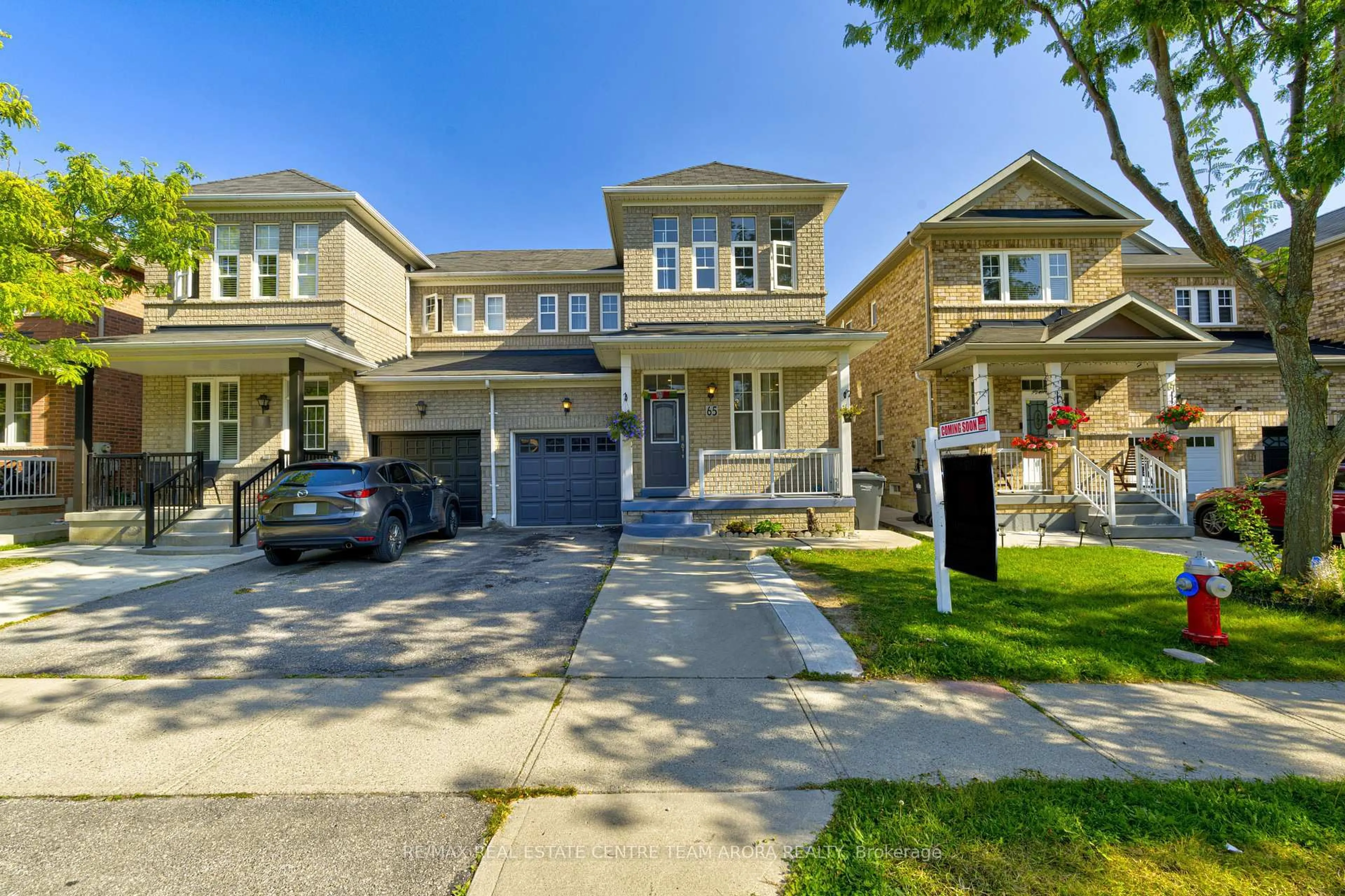 Home with brick exterior material, street for 65 Pergola Way, Brampton Ontario L6Y 5N1