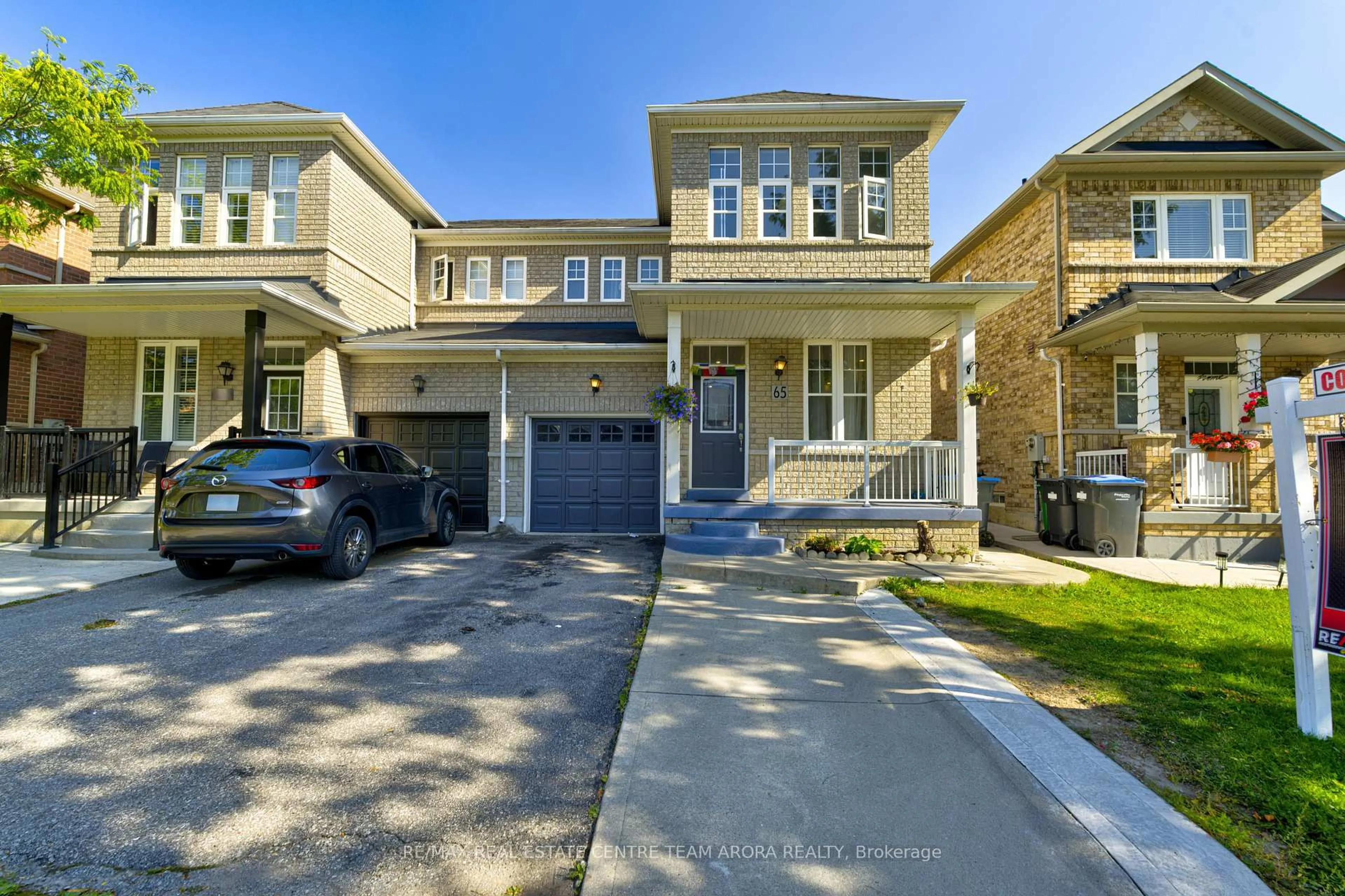 Home with brick exterior material, street for 65 Pergola Way, Brampton Ontario L6Y 5N1