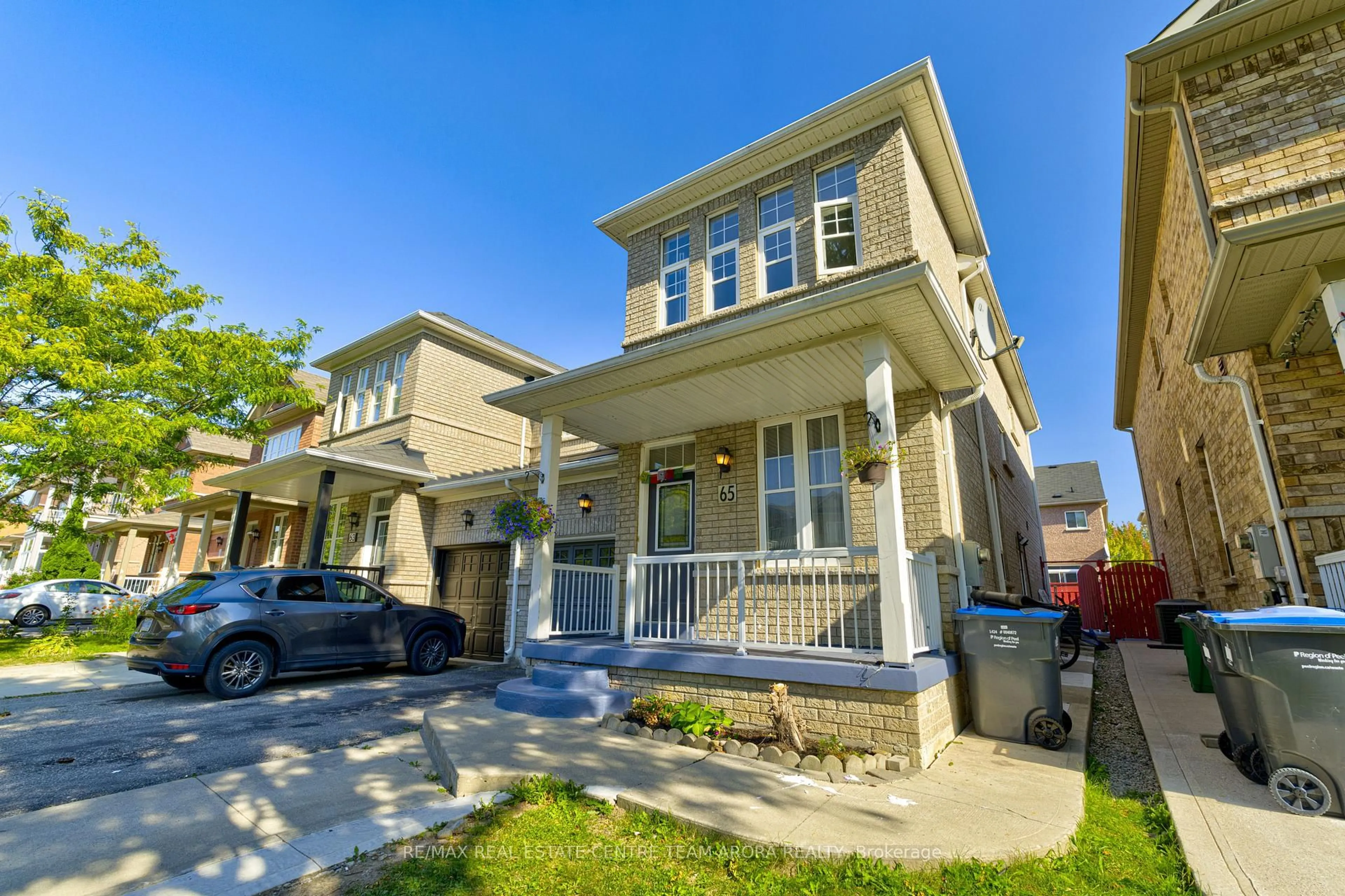 Home with vinyl exterior material, street for 65 Pergola Way, Brampton Ontario L6Y 5N1