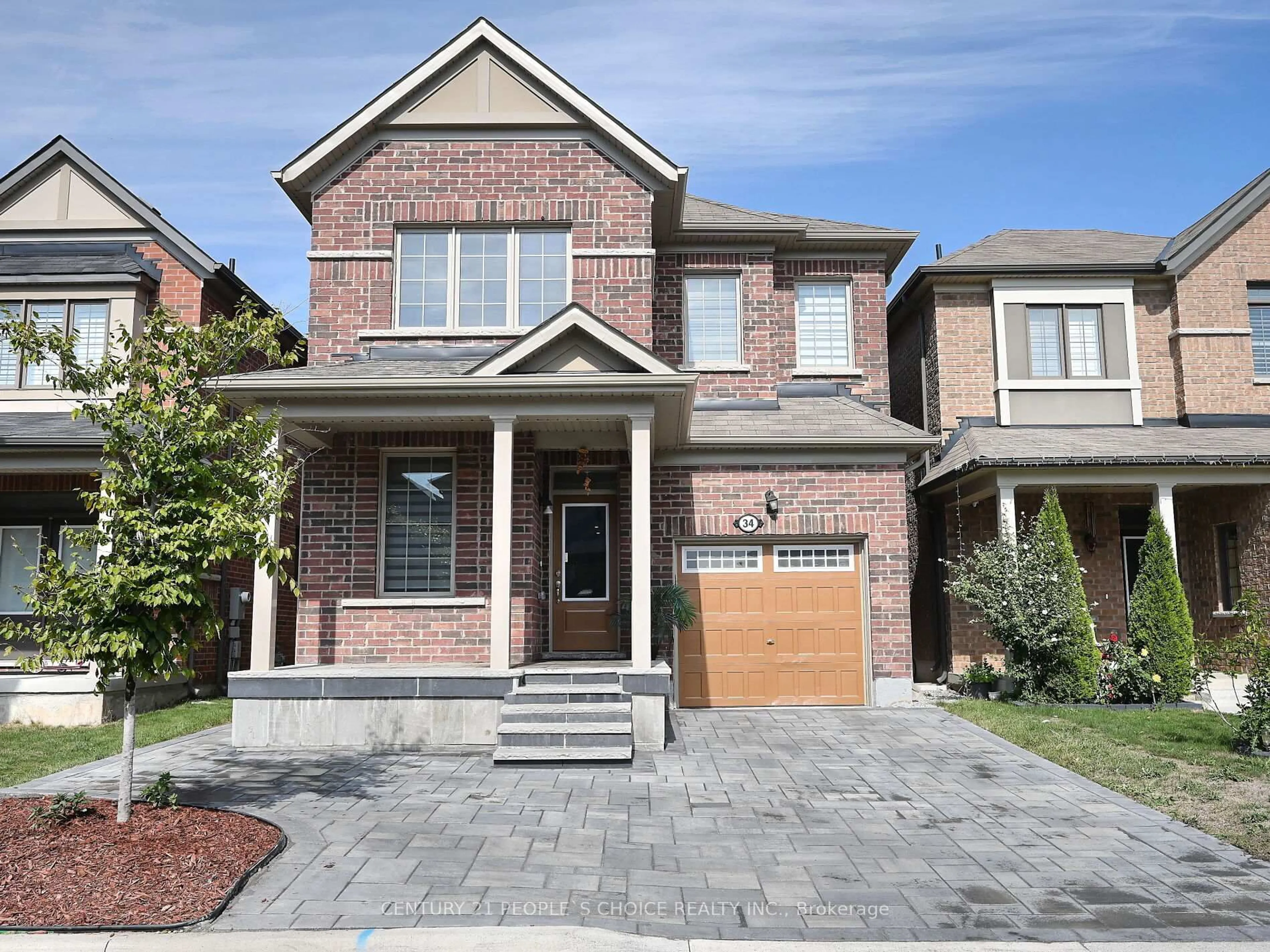 Home with brick exterior material, street for 34 Cyclone Tr, Brampton Ontario L7A 5E7